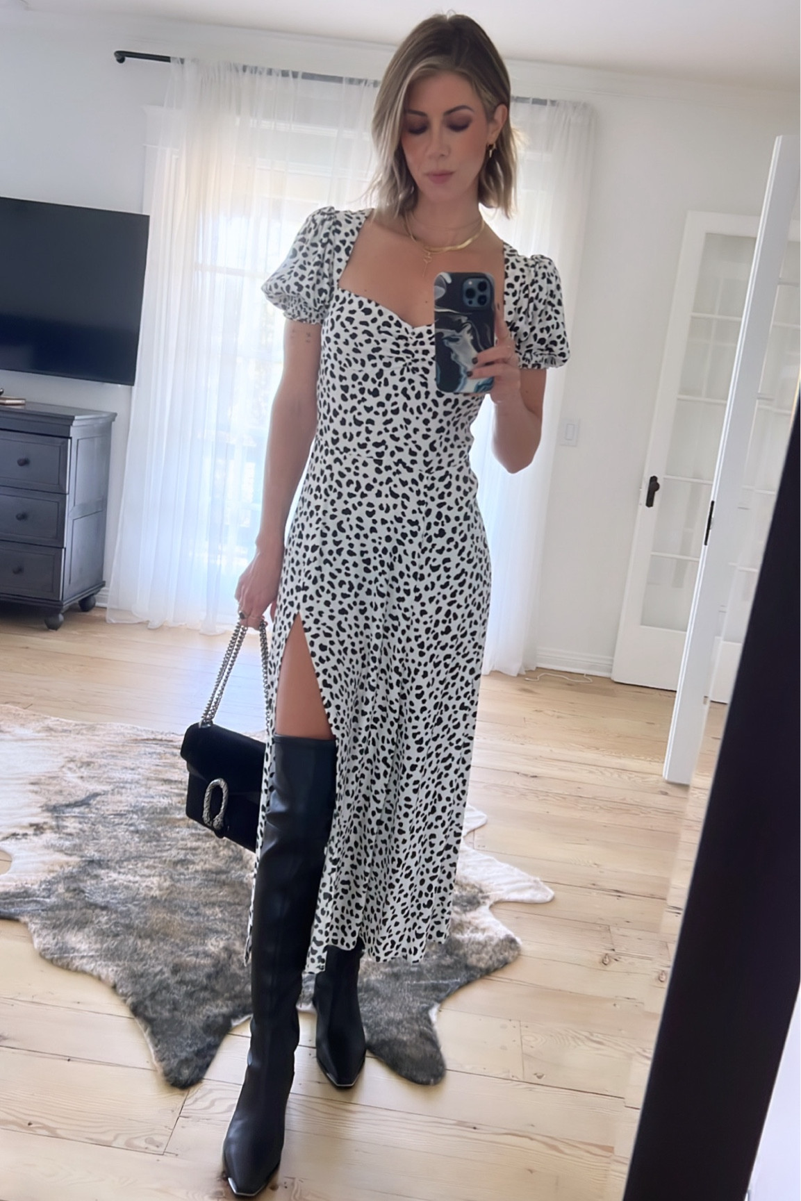 Chic Spring look. High slit dress and thigh high boots. 

#LTKSeasonal #LTKover40 #LTKstyletip