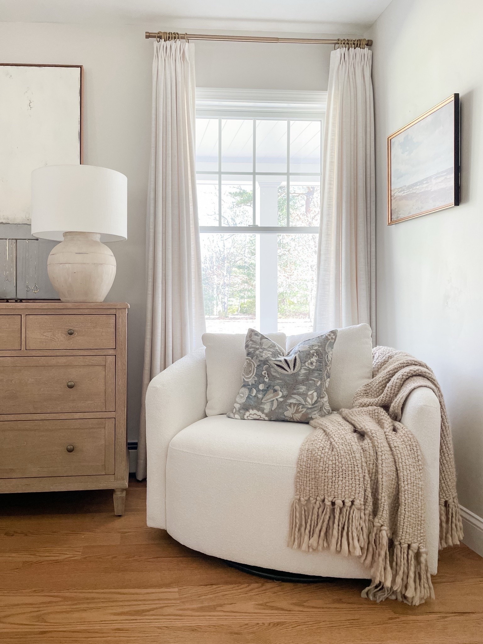 I just love this cozy corner in our coastal bedroom! 🤍 This chair has been a longstanding bestseller, and it’s easy to see why given its approachable price point. I also adore this spring print on this throw pillow—just the right amount of color! 

#LTKSaleAlert #LTKHome #LTKSeasonal