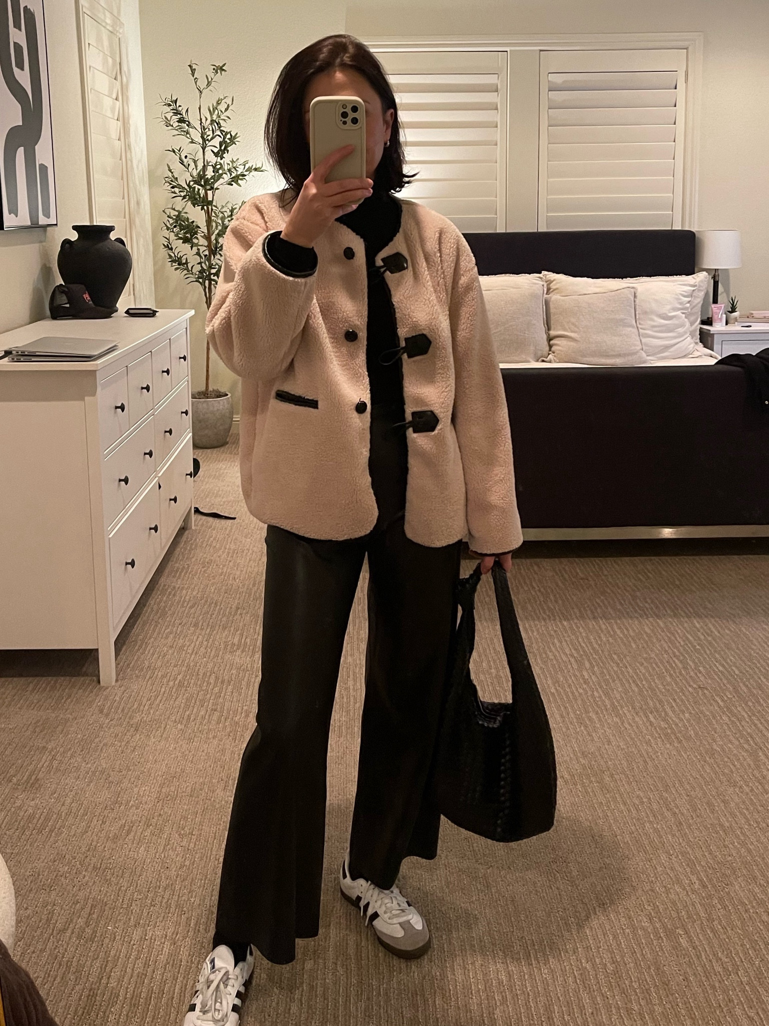 The toteme jacket on trend  #lookforless 
Paired with leather pants 
Adidas sambas and 
Anthropology woven knot bag
 #mango

#LTKshoecrush #LTKstyletip #LTKitbag