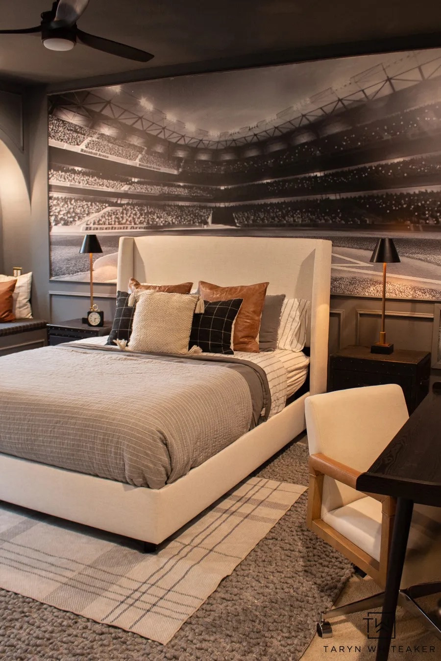 This sports-inspired bedroom is such a statement 🖤 The oversized stadium mural completely transforms the space, while the neutral bedding and warm leather accents keep it feeling elevated and timeless.

#LTKSeasonal #LTKHome
