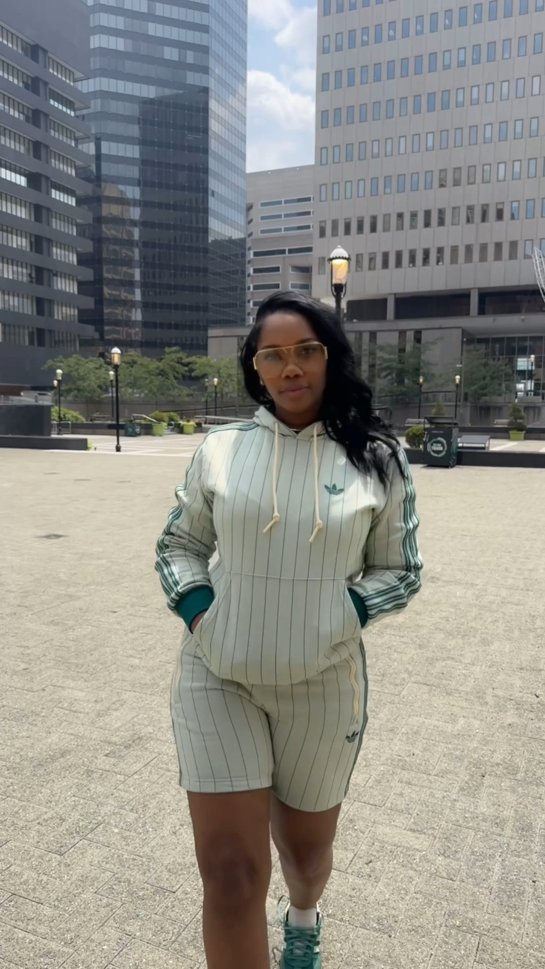 This olive green pinstripe hoodie with the matching pinstripe shorts by @adidas is so classic. It can be worn during cooler summer months and easily transitions into early fall for a fresh back to school outfit.  Whether you are traveling and need an airport ready fit, running errands or running the streets, this is the look! I’m wearing a size XS hoodie and XS shorts, I could’ve gone up to a size S or M in shorts. 

#ltkstyle #outfitinspo #summeroutfit

#LTKootd #LTKTravel #LTKPetite