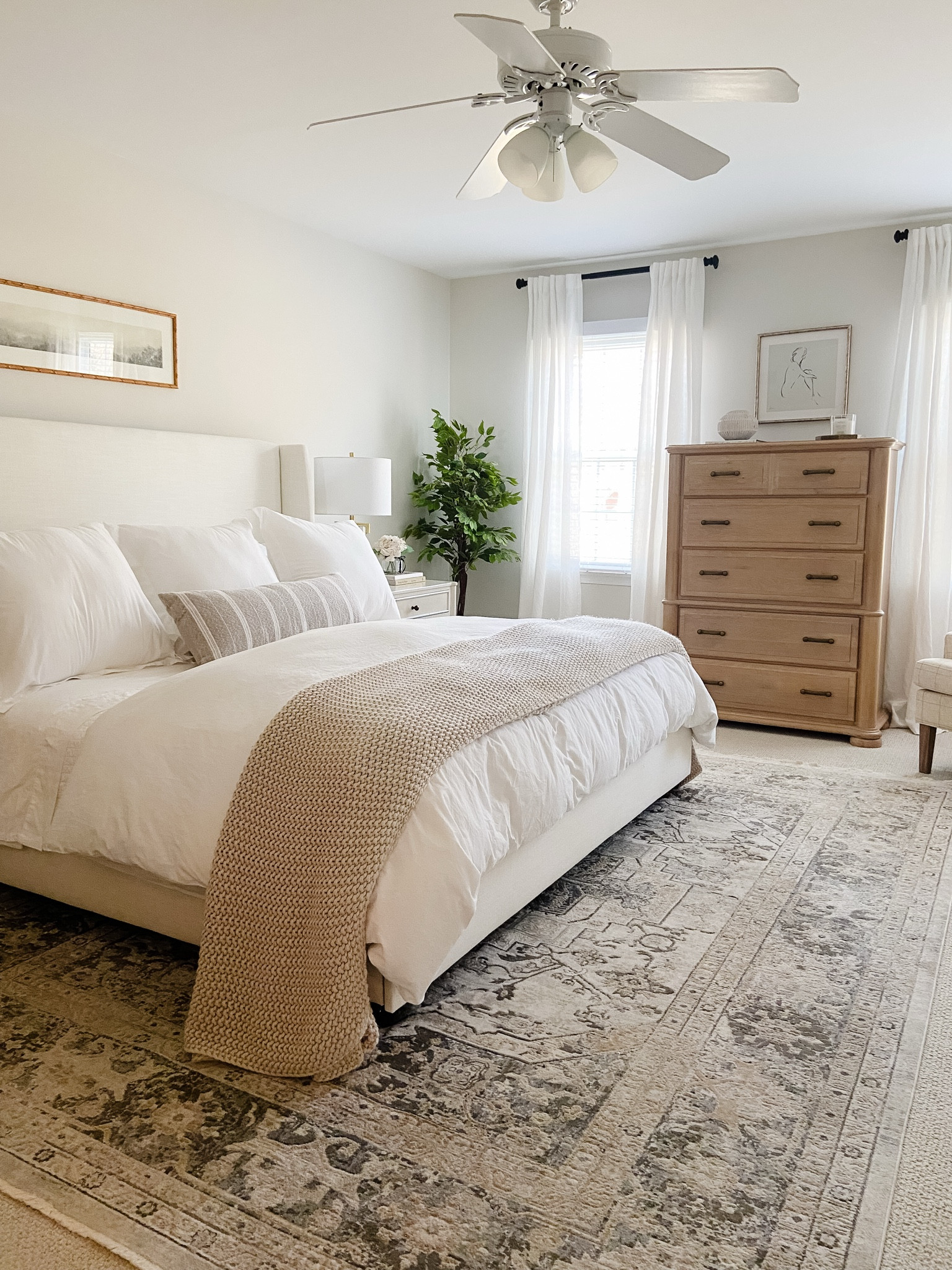 Neutral Bedroom Decor 🤍
#bedroomdecor #bedroomdesign #bedding #nightstands #dressers #neutralhome #upholsteredbed #neutralrug #wallart 

#LTKHome