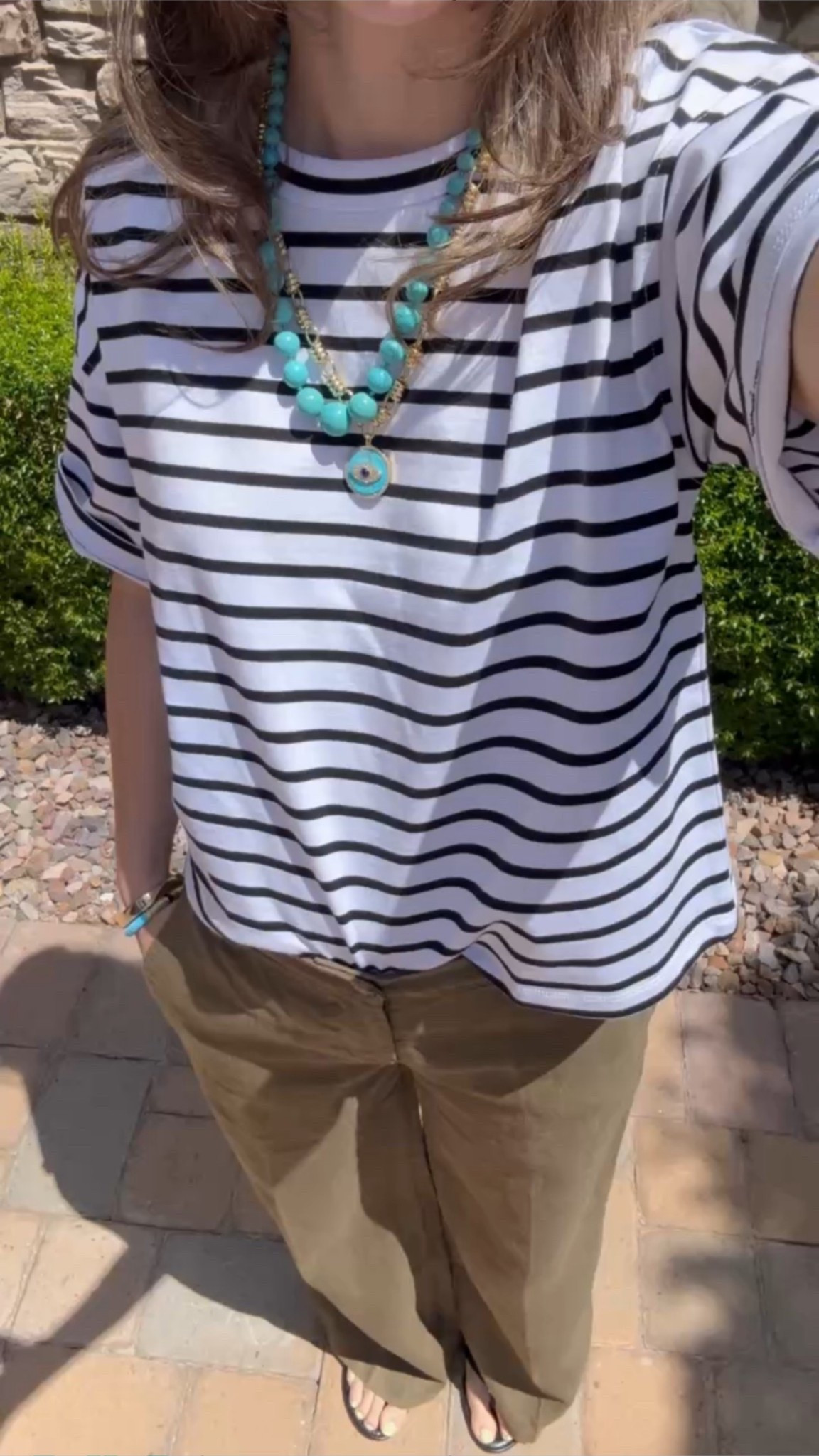 A striped tee that doesn’t overwhelm a 5’2 frame is a rare find.

This one drapes just right, hits at the perfect length, and works tucked or untucked. I paired it with wide-leg trousers for a relaxed but elevated mom look — comfortable enough for real life, polished enough to feel intentional.

These are the kind of basics I build outfits around all season.

Petite-friendly striped tee
5’2 outfit idea
Wide-leg trousers
Elevated casual mom style