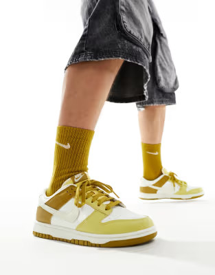 Nike Dunk Low Retro sneakers in yellow and tan | ASOS (Global)