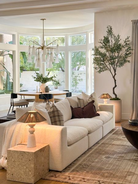 Couch

Tree, lamps, marble table, light fixture 

#LTKstyletip #LTKfamily #LTKhome