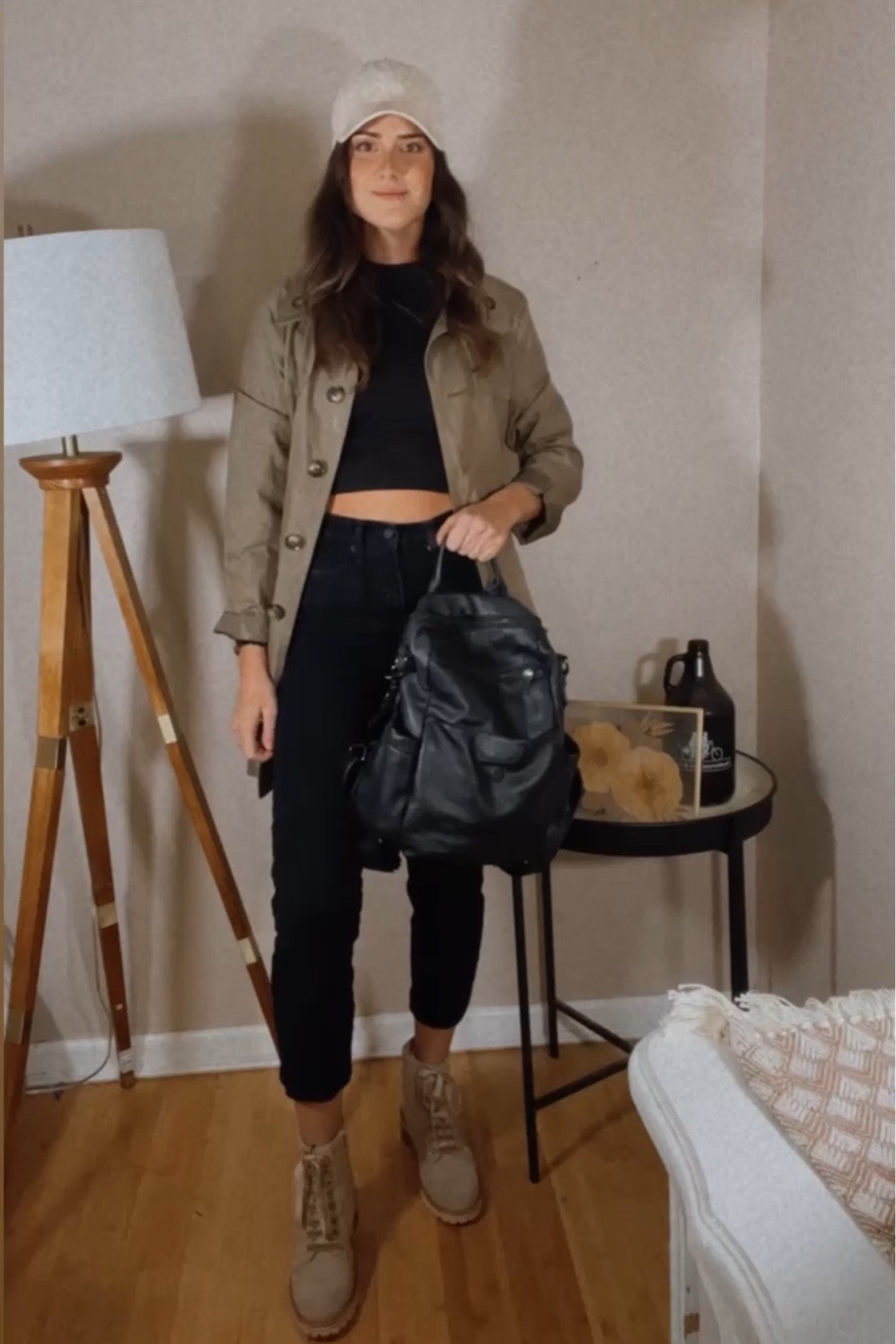 Black jeans// trench coat// tan booties// black leather backpack// tan baseball hat // black turtleneck 

#LTKSeasonal #LTKshoecrush #LTKGiftGuide