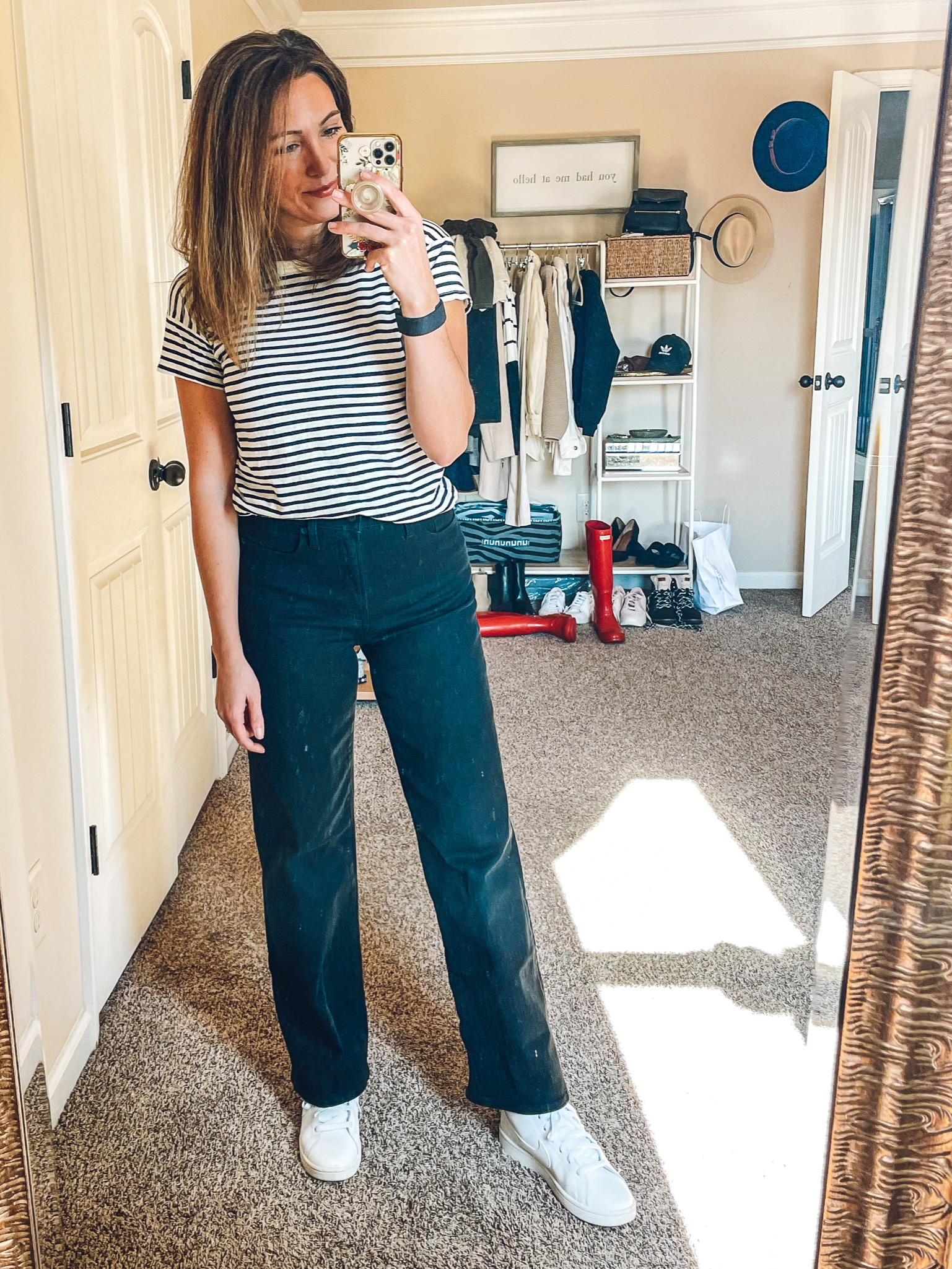 Entire outfit is 40% off today! Shop with code LETSGO . Tee is from last year so I linked several other stripe options (all on sale). Jeans are super stretchy so stick with your normal size or size down one if between sizes. Sized up 1/2 size in Nikes. 

#LTKfindsunder100 #LTKCyberWeek #LTKsalealert