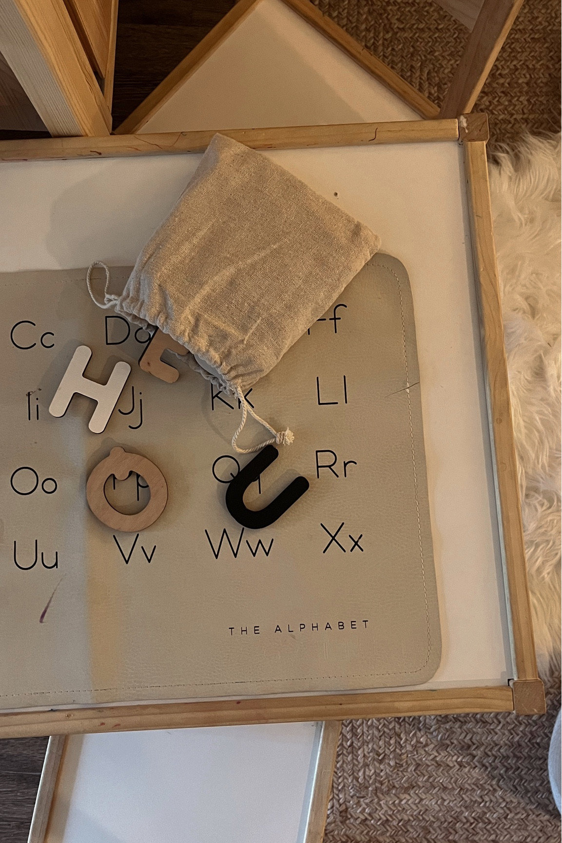 ABC puzzle, letter matching, wooden letters, wood toys, handmade toys, Gathre, leather mat, placemat, educational, learning materials, neutral home, playroom, playroom toys, ikea table, ikea home

#LTKbaby #LTKkids #LTKhome