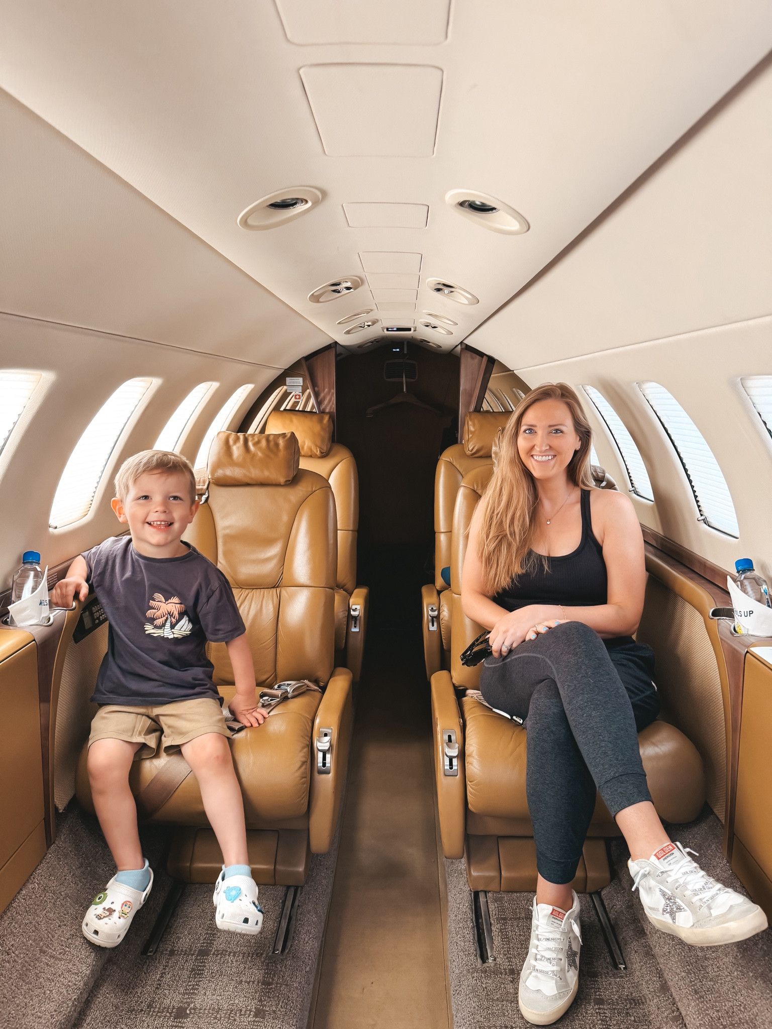Running some errands in our private plane ✈️ jk just visiting daddy at work. Not a bad office right?! 
casual cute athleisure, golden goose shoes #pilotwife #privateplane #goldengoose #flyprivate #momlife #toddlermom #lululemon #vuori 

#LTKActive #LTKTravel #LTKShoeCrush