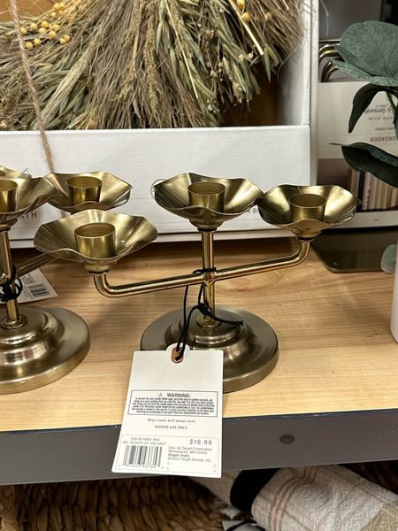 This gold 3 candle holder is adorable! I love to thrift vintage brass candlesticks and this would fit right in! 

#LTKGiftGuide #LTKfindsunder50 #LTKhome