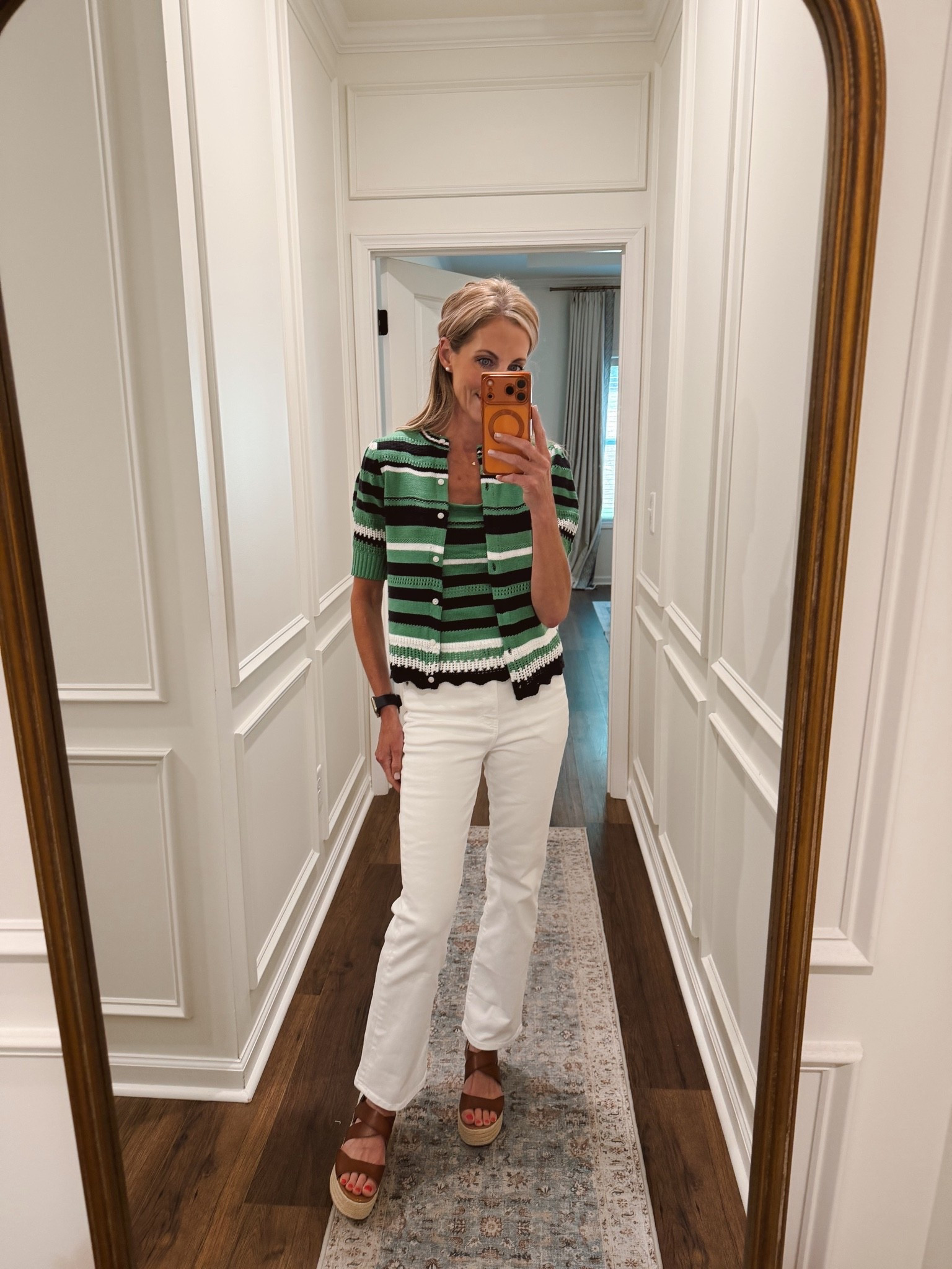 Walmart new arrival that is still in stock. This striped cardigan is $30. It’s short sleeve and lightweight looks great with its matching tank top both size extra small.