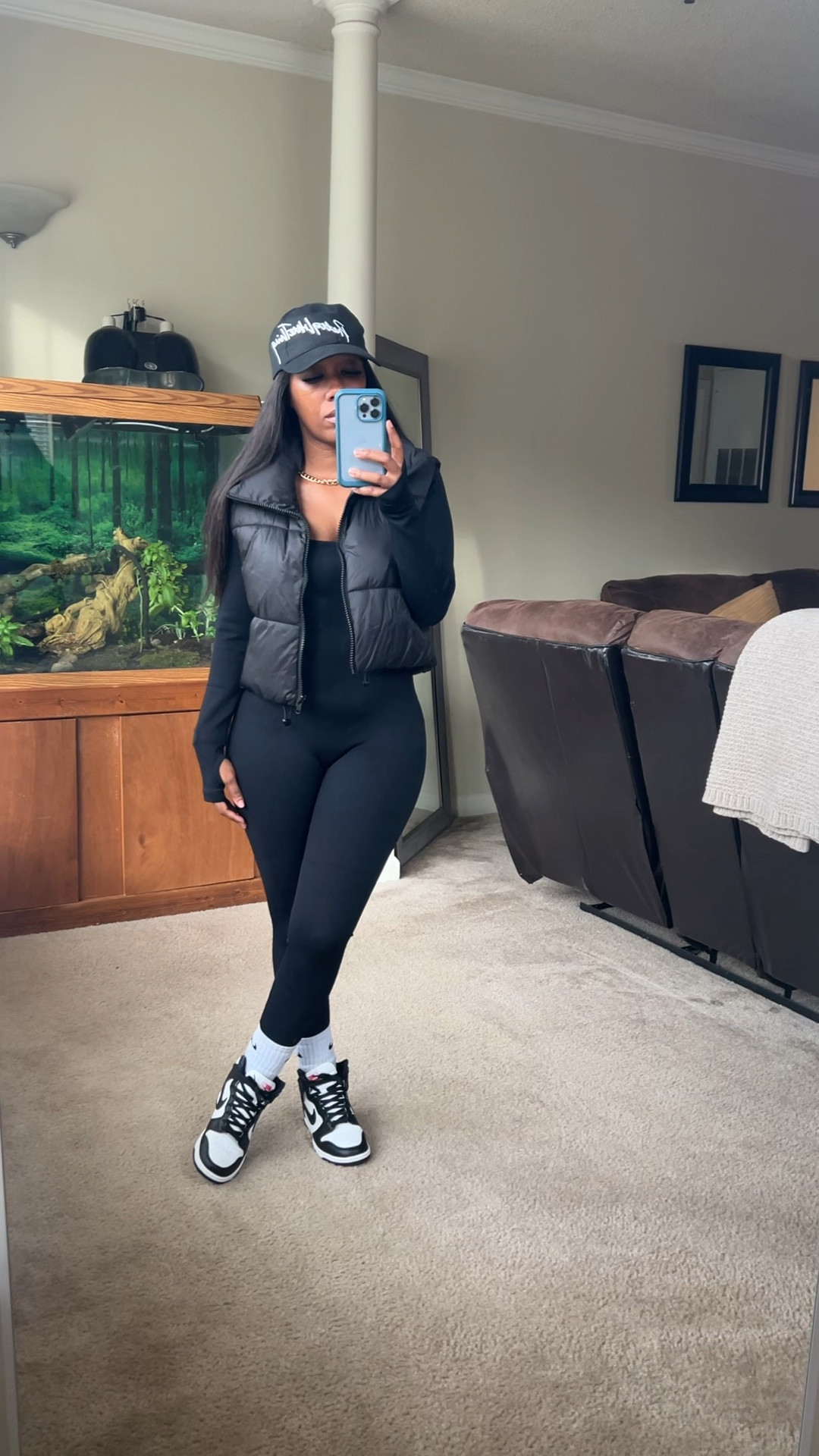 Athleisure fall outfit.

I’m wearing a black seamless ribbed jumpsuit with a black puffer vest.

I styled this outfit with a black hat and black and white Nike dunks high sneakers

#LTKFitness #LTKStyleTip #LTKActive