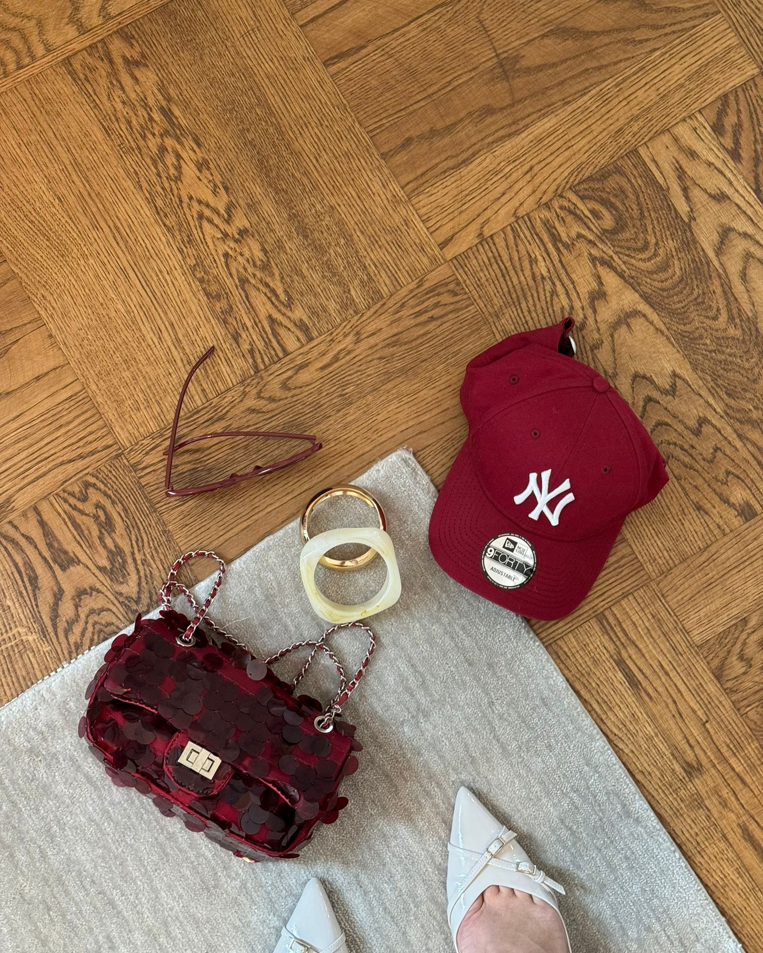 A pop of red, red accessories, NY red hat, asos oversized tshirt, cream heeled shoe, red sequin bag, jaded tartan puff ball skirt, street style 

#LTKeurope #LTKstyletip #LTKuk