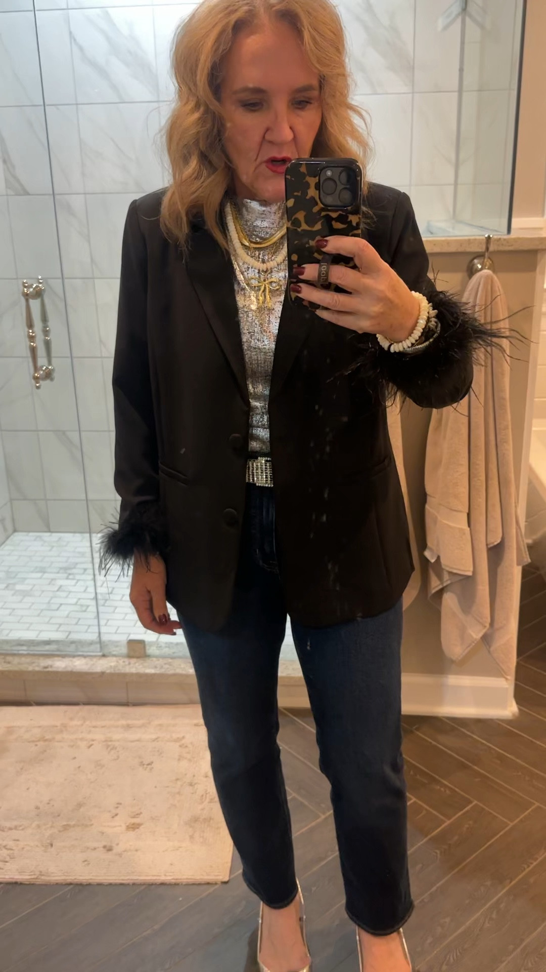 Holiday party outfit idea! Last minute mocktail party! 

The blazer is limited. I’m in a large. Feather trim is removable. Found a similar at Chicos with lots of sizes! 

Mock knit turtleneck size medium. 

Jeans order smaller size 

Silver slingbacks I’ll link some options 

Great NYE outfit too for dinner out or just having friends over. 

20% off Allie Bess jewelry with code NANETTE20

#LTKFindsUnder100 #LTKHoliday #LTKOver40