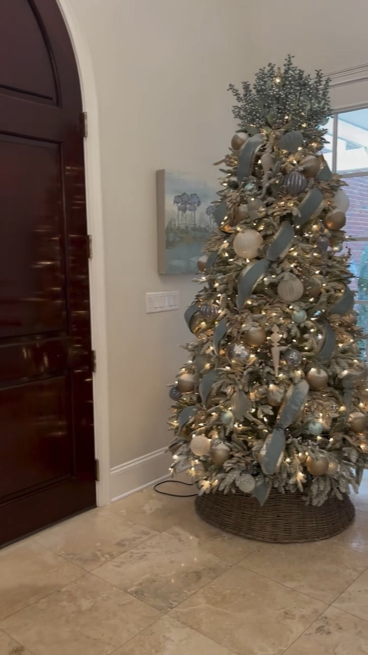 Champagne makes everything better!  It took a while to find this color blue but when I did I knew it would look great with champagne. This tree still makes me smile! 
.
.
.
.
#christmastreedecorating #lightbluechristmas #holdmyeggnog #christmasinspo #christmasinspiration #christmasinjuly #christmaschampagne #bluechrostmasdecor #pastelchristmasdecor #christmastreeinspo #christmastreetrends #christmasallyearlong #christmastreeohchristmastree #christmastreestylist #professionalchristmastreedecorator