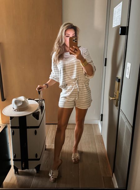 (Use code JANUARY10 for discount) Traveling back home this am. This stripe knit shorts set is so good for being casual and still looking pulled together and comfortable. 🙌🏻 spring outfit, summer outfit, stripe knit top with sleeves, drawstring shorts, neutral outfit, sandals

#LTKstyletip #LTKover40 #LTKtravel