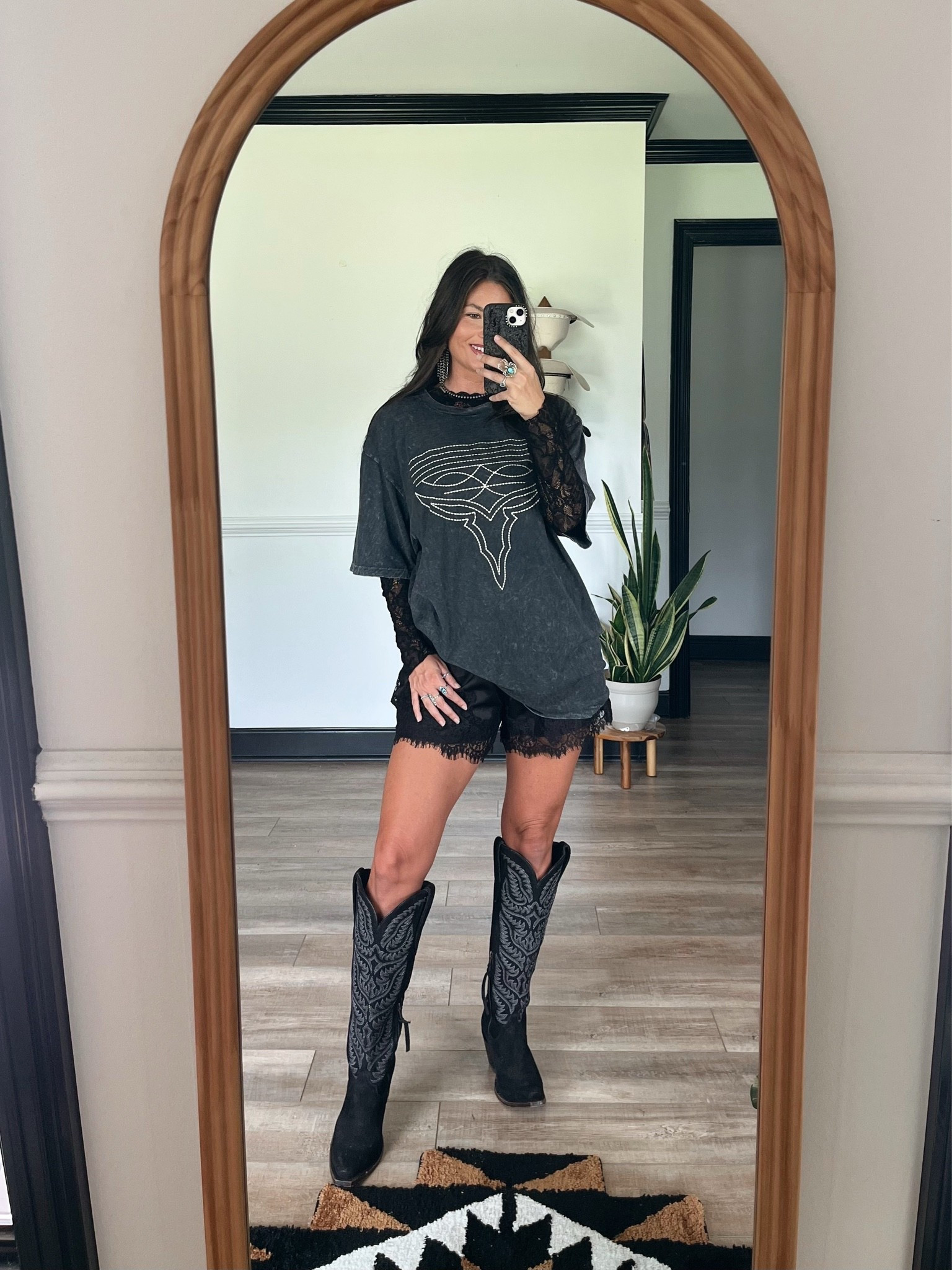 Boot stitch graphic tee paired with lace satin shorts and boot! Layering is of my favorite ways to style graphic tees! Wearing large tee and medium short. Shorts run small

#LTKootd #LTKgrwm #LTKSeasonal