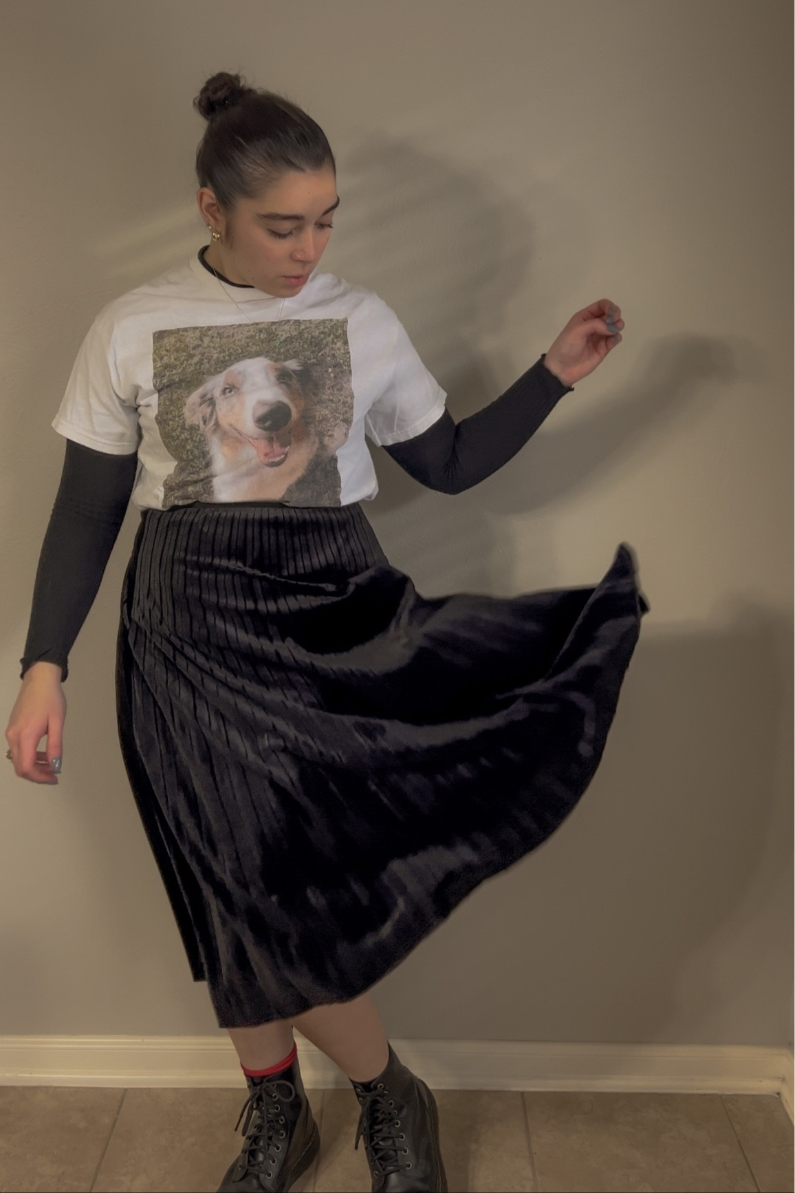 Long black skirt, black boots, styled with a t-shirt and a slicker bun 

The t-shirt is a picture of one of my dogs & I spiced it up by adding a long skirt 🖤

#LTKunder50 #LTKunder100
