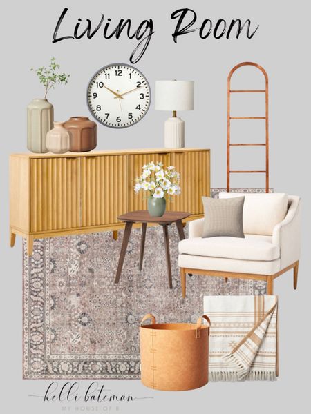 Living Room Decor. Accent chair, media console, sideboard,  cabinet, rug, storage baskets, blankets and throw pillows, arched book shelves, vases and faux stem. 

#LTKSeasonal #LTKhome #LTKFind