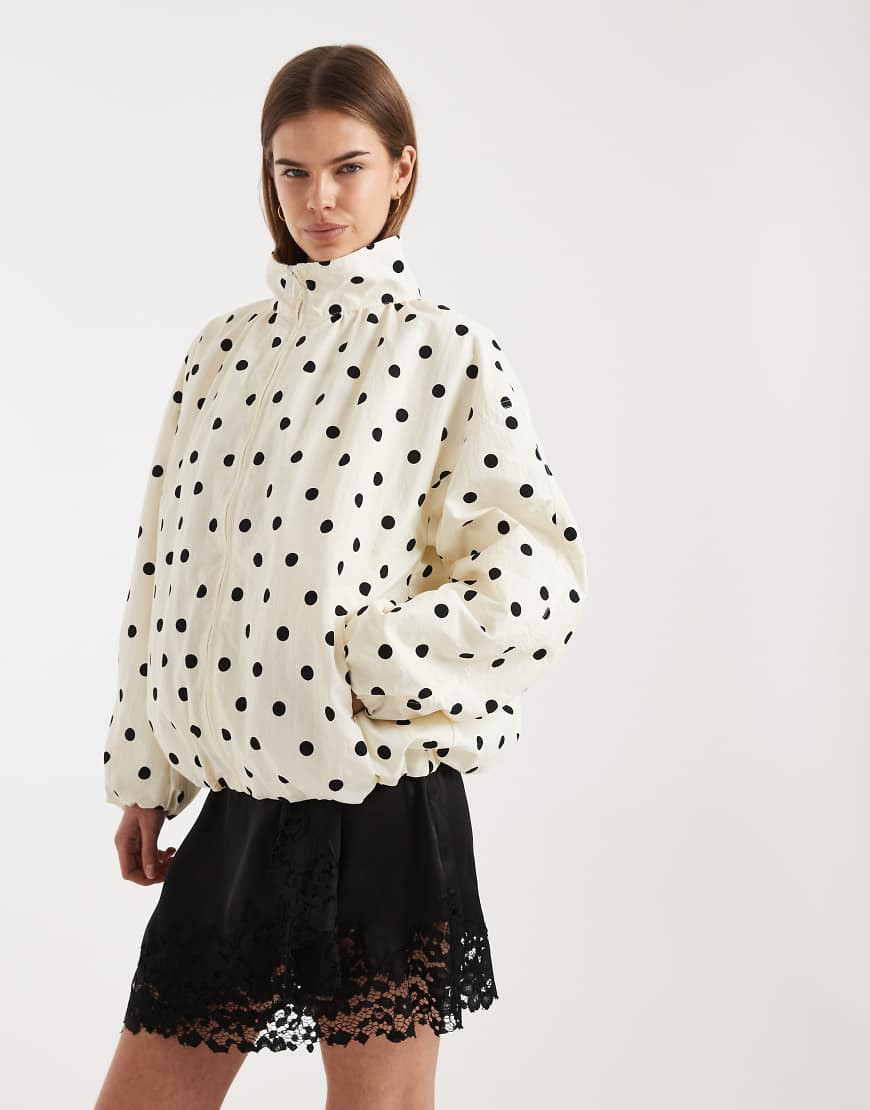 ASOS DESIGN oversized bubble hem track jacket in polka dot-Black | ASOS (Global)