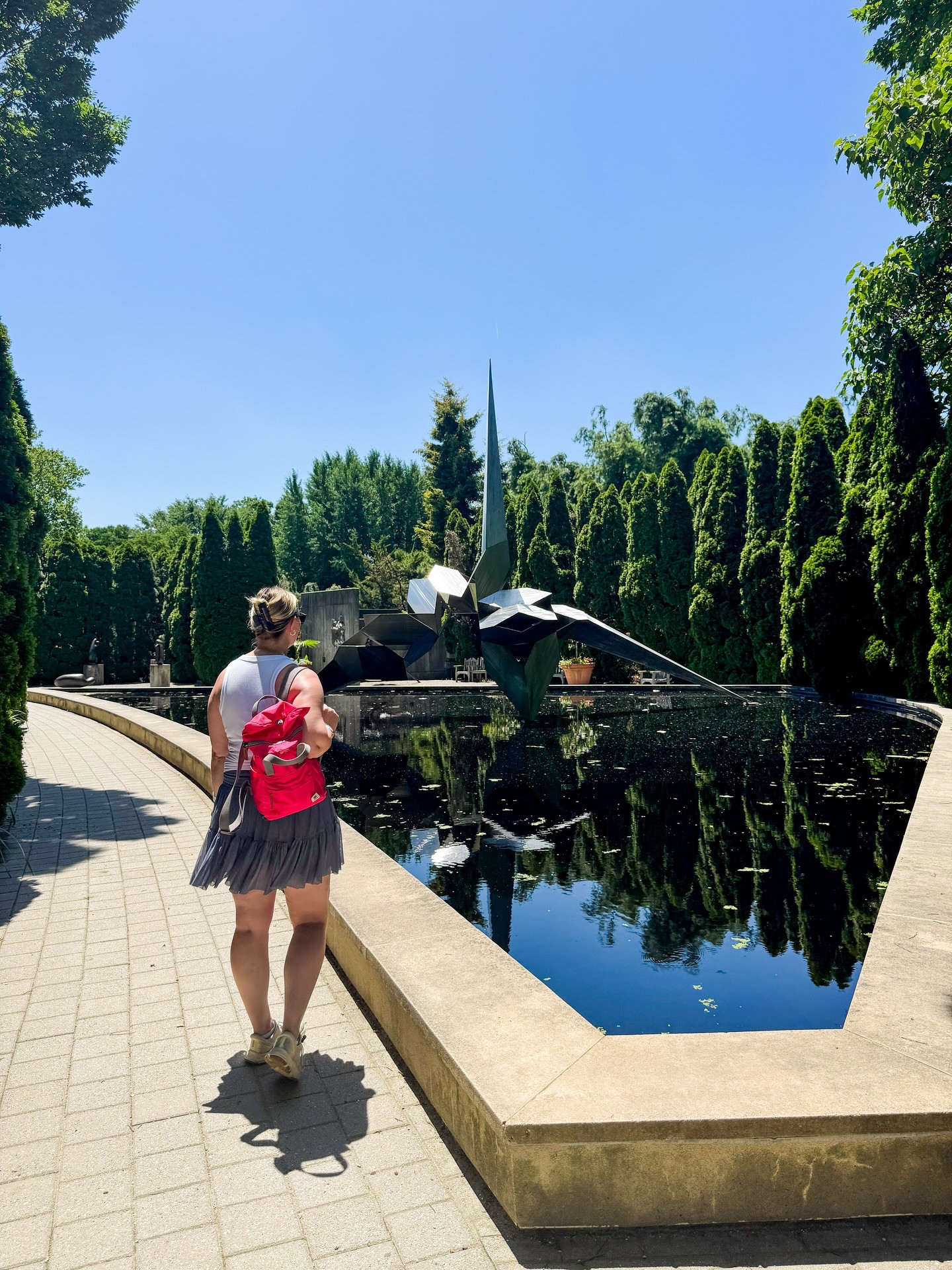 Made it back to @groundsforsculpture this year! Happy to see two new exhibits and revisit some old favorites. Have you checked it out yet?? 
📍Located in Hamilton, NJ

Sported an easy breathable look for the day… it was HOT outside!
top: @loft purchase from last year with built in bra (and wore my @cakesbody all day with it!) 
bottoms: @blogilates ballerina skort I purchased from @target earlier this year and they just restocked! 
bag: @oribagcompany which fits so much and has so many neat and safe contraptions inside to store your belongings. 
Earrings: @melindamaria_jewelry (code LINDSEY saves you 10%!) 

Shop the look via LTK/ShopMy/Target Storefront! // https://goto.target.com/c/2656657/1799385/21323?u=https://www.target.com/finds/collections/3yKLdvLVySM2SggrwxKiza
.
.
.
.
.
.
.
.
@targetstyle #blogilates #heyori #thingstodonj #museum #sculpturegarden #hamiltonnj #groundsforsculpture #targetfinds #targetstyle #targetfashion #midsizefashion #ryka #loveloft #loftimist #mmlove #njisntboring #thingstodo #summerfashion #summerstyle #activewear #casualfashion #cakes #targetcreator