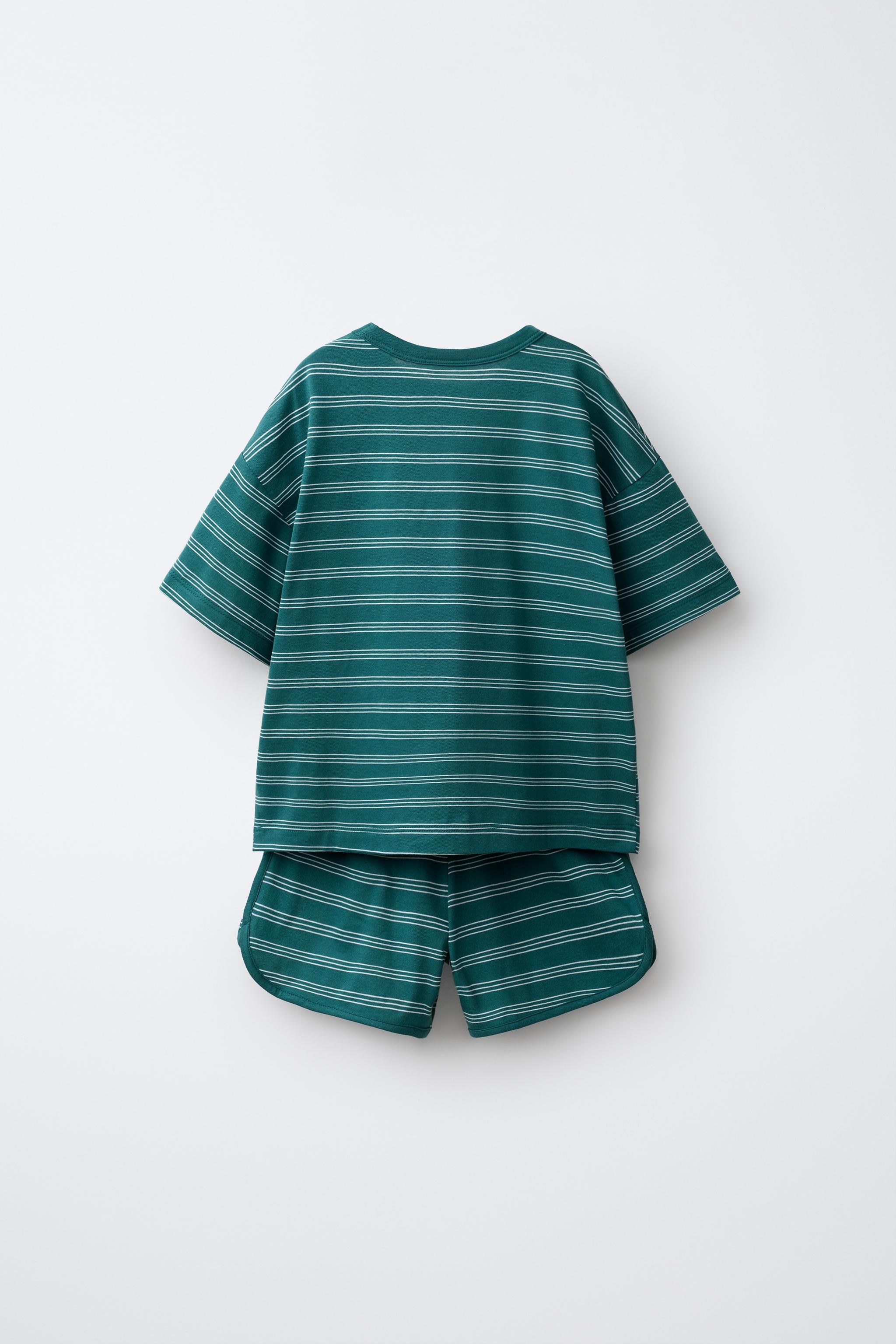 Two-piece set. Round neck T-shirt with short sleeves. Bermuda shorts with an elasticated waistban... | Zara UK