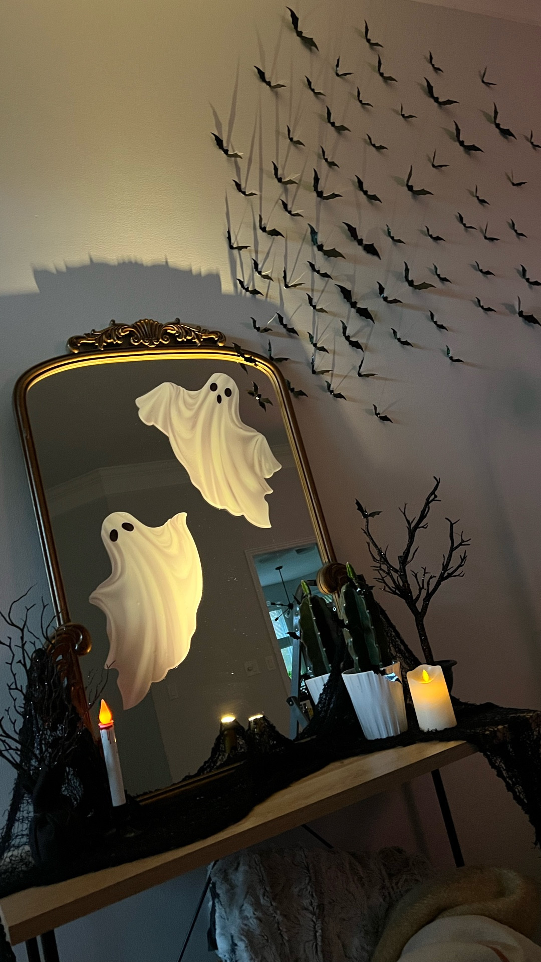 Spooky season is here 👻🕯️✨ I had so much fun putting together this Halloween entry table with flying bats, glowing ghosts, and cozy candlelight. All the details are linked for you on my LTK so you can recreate the look at home! 🦇🖤

#HalloweenDecor #LTKhome #spookyseason

#LTKHalloween #LTKHome #LTKFallSale