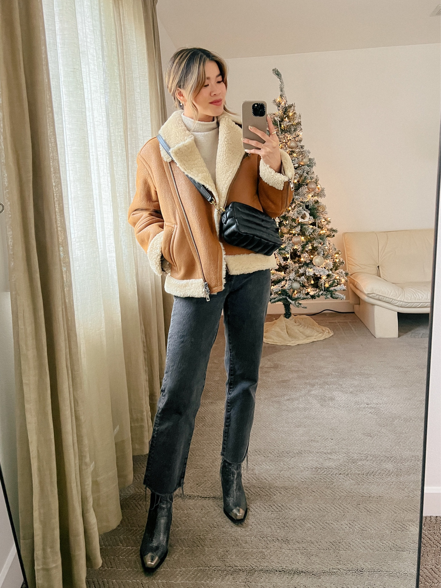 A cream mock neck sweater under a Madewell oversized shearling-lined brown moto jacket and black denim with Free people black western booties!
 
Top: XXS/XS
Bottoms: 00/0
Shoes: 6

#winter
#winteroutfits
#winterfashion
#winterstyle
#holiday
#giftsforher
#lululemon
#freepeople 
#madewell


#LTKstyletip #LTKHoliday #LTKSeasonal
