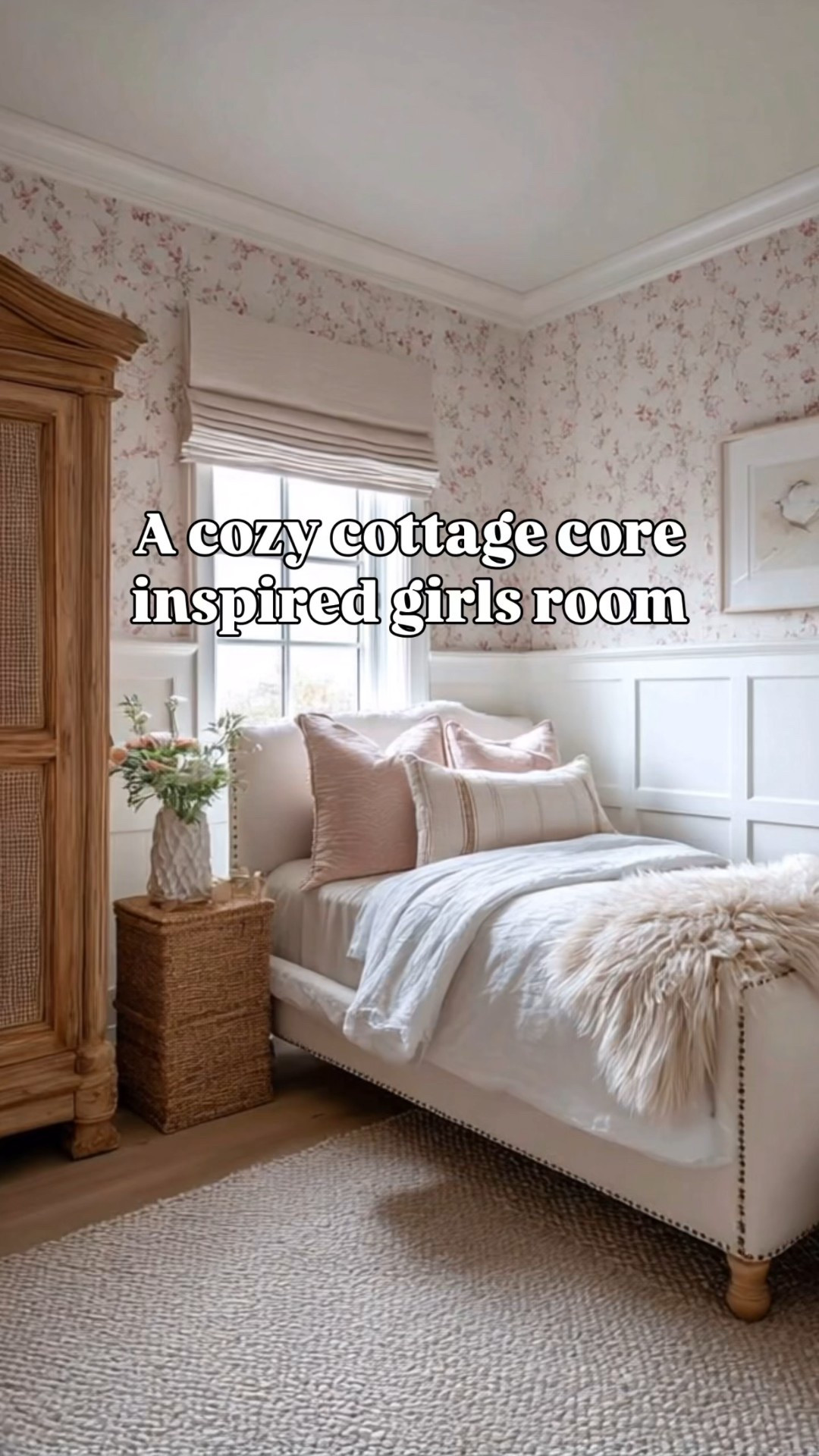 This soft and feminine bedroom blends classic cottagecore charm with timeless textures. Featuring a tufted cream upholstered daybed with wood legs, layered pink and ivory pillows, blush sheepskin throw, and a natural woven nightstand, this space is both dreamy and functional. The floral wallpaper and white board-and-batten wainscoting add warmth and vintage appeal, while the Roman shade and chunky knit rug tie everything together. Perfect inspiration for a girl’s bedroom refresh or a guest room that feels like a hug.

cottagecore bedroom, girl’s bedroom decor, pink bedroom, upholstered daybed, floral wallpaper, wainscoting, vintage decor, romantic room design, neutral bedding, cozy bedroom inspiration, blush and white decor, LTK bedroom finds, feminine bedroom styling, soft textures, woven furniture

#LTKHome