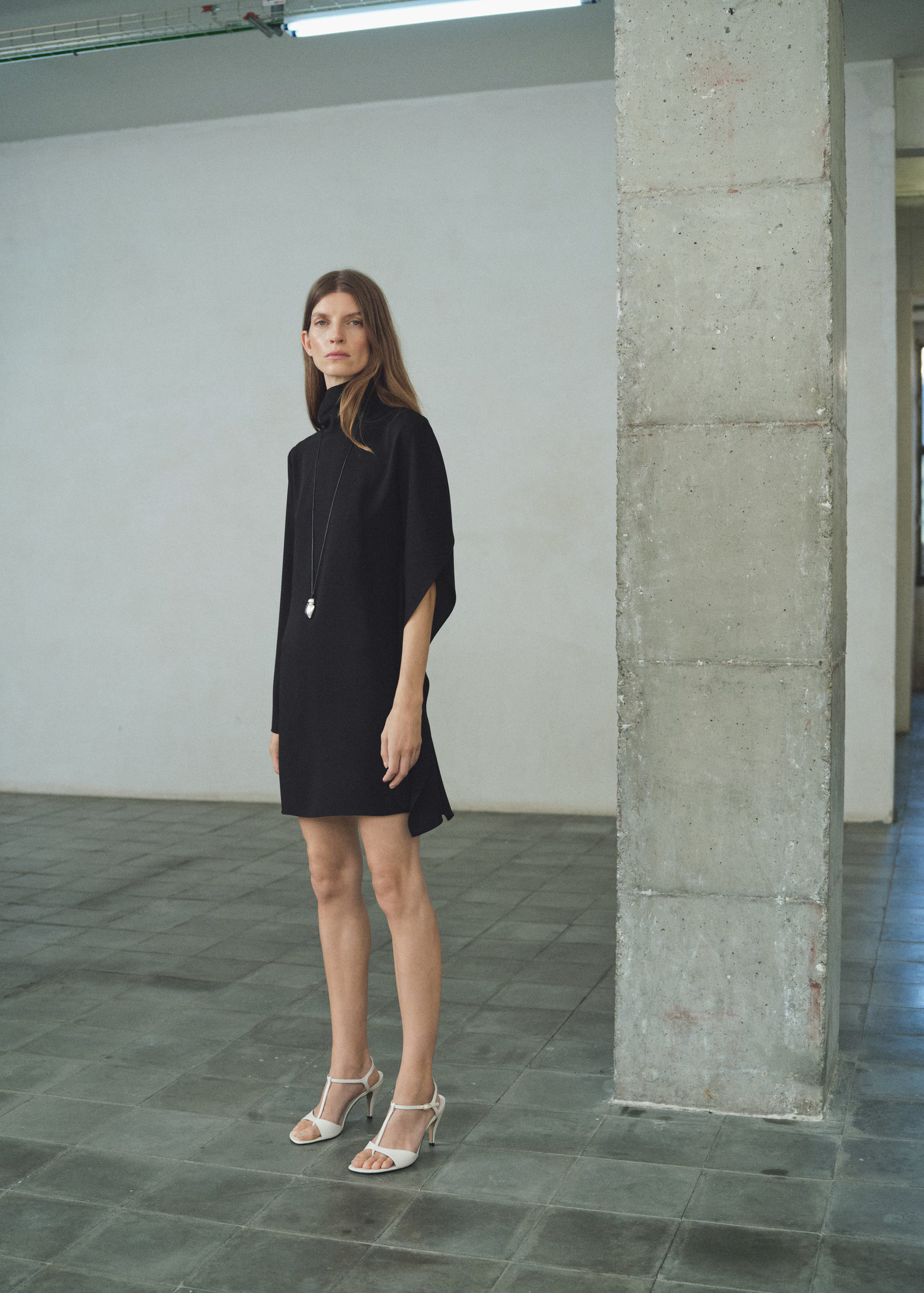 Turtleneck dress with asymmetrical sleeves | Mango (US/MX/AU)