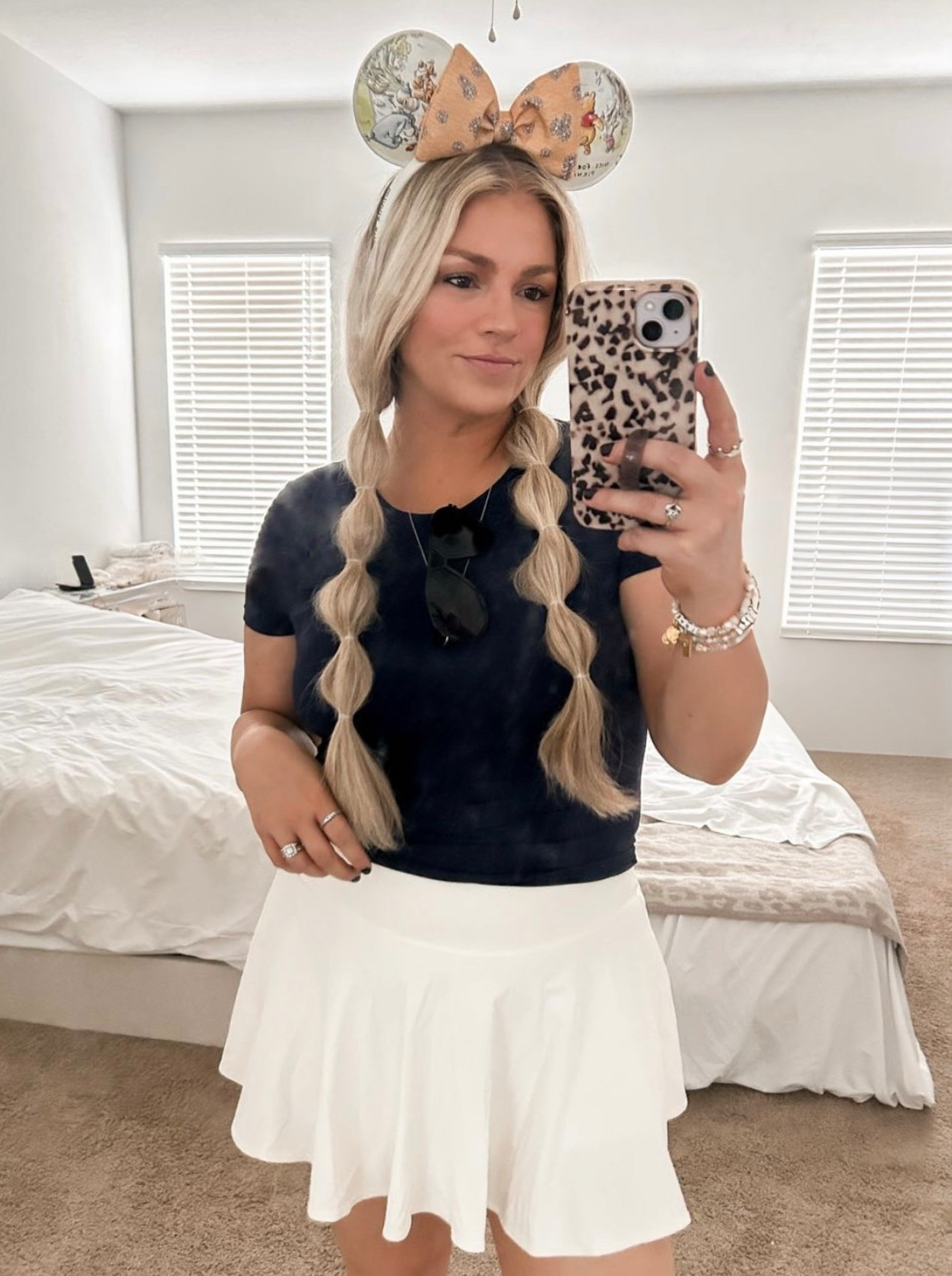 A few of my new favorites! This is my favorite Amazon skort! Super soft and comfy. Perfect for park days or running the kids around. Shorts underneath. I got a medium. And I love this athletic top! It has a built in shelf bra and is super comfy. Fitted style 

#disney 

#LTKStyleTip #LTKOver40 #LTKActive