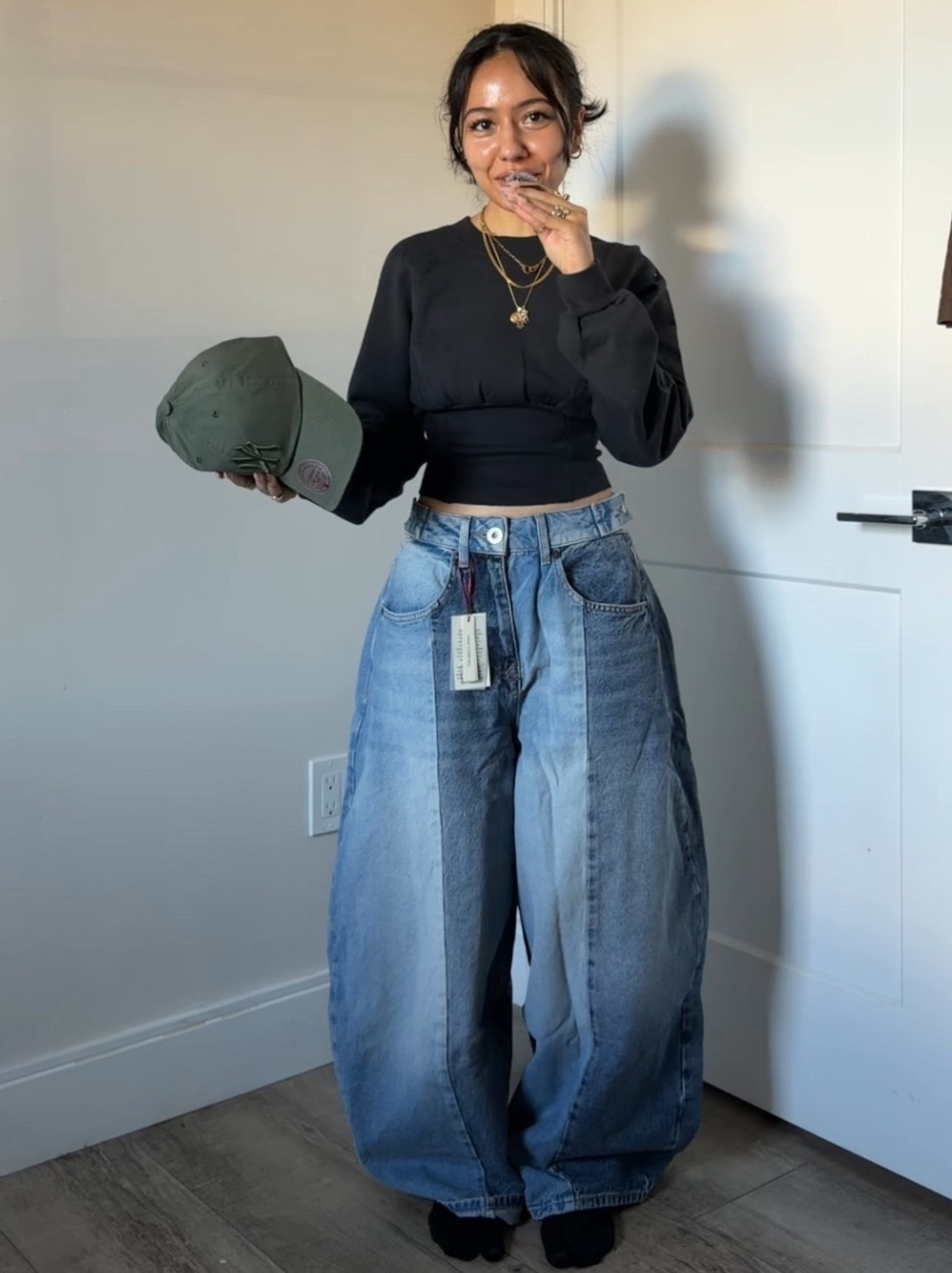 I got the jeans in size 24 and the tops are both an XXS; everything fits true to size :)