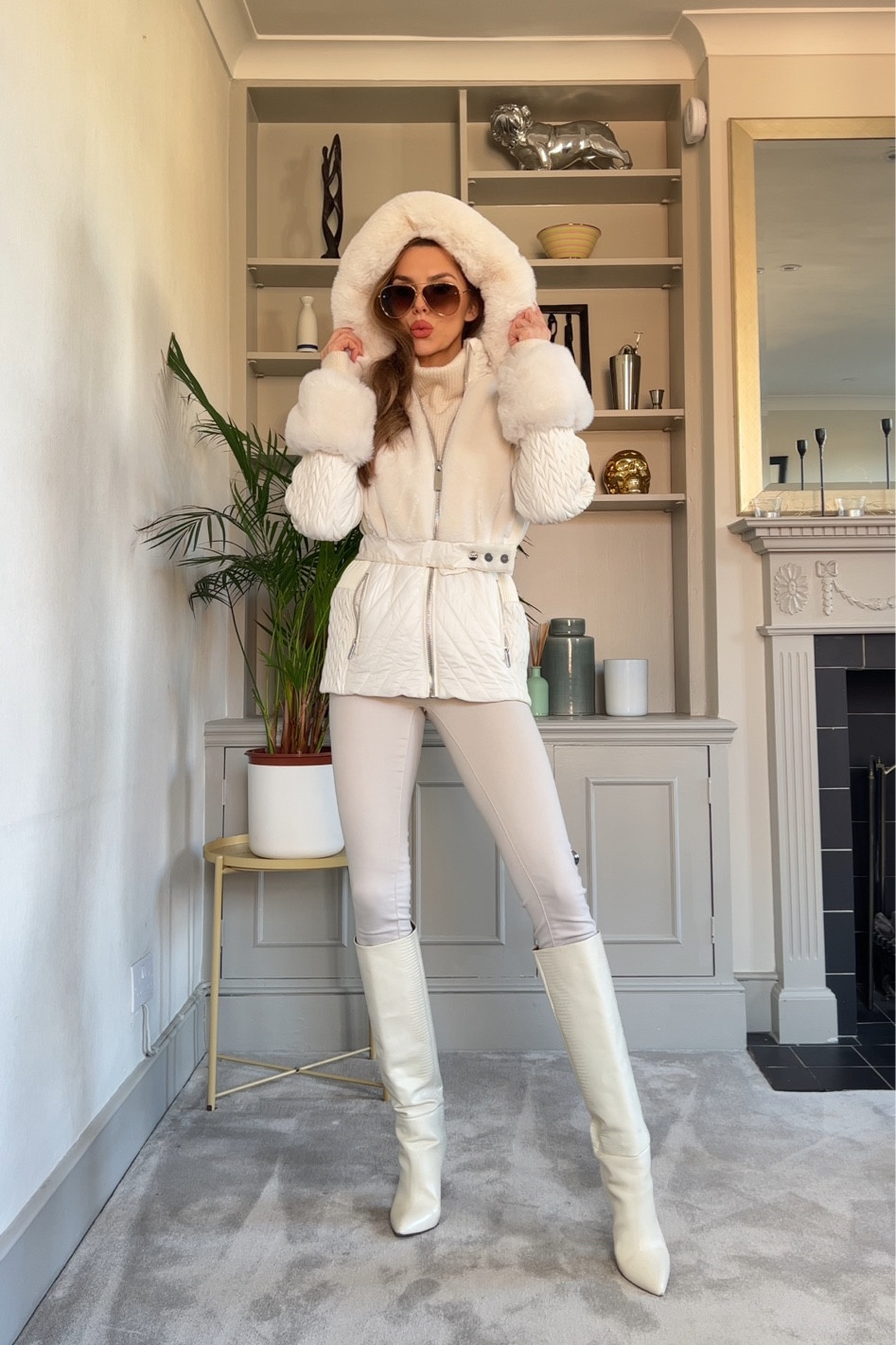 - Ivory quilted belted short coat with faux fur hood.

#LTKFind #LTKeurope #LTKSeasonal