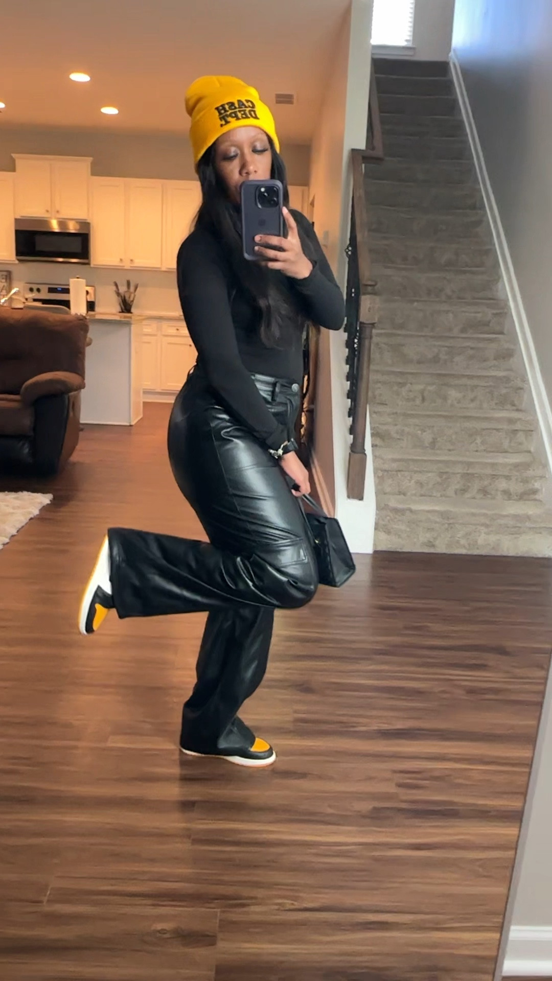 Yellow and black outfit idea.
I’m wearing a black bodysuit, black faux leather cargo pants, yellow and black beanie, black purse, and Jordan 1 taxi sneakers

#LTKStyleTip #LTKSeasonal #LTKShoeCrush