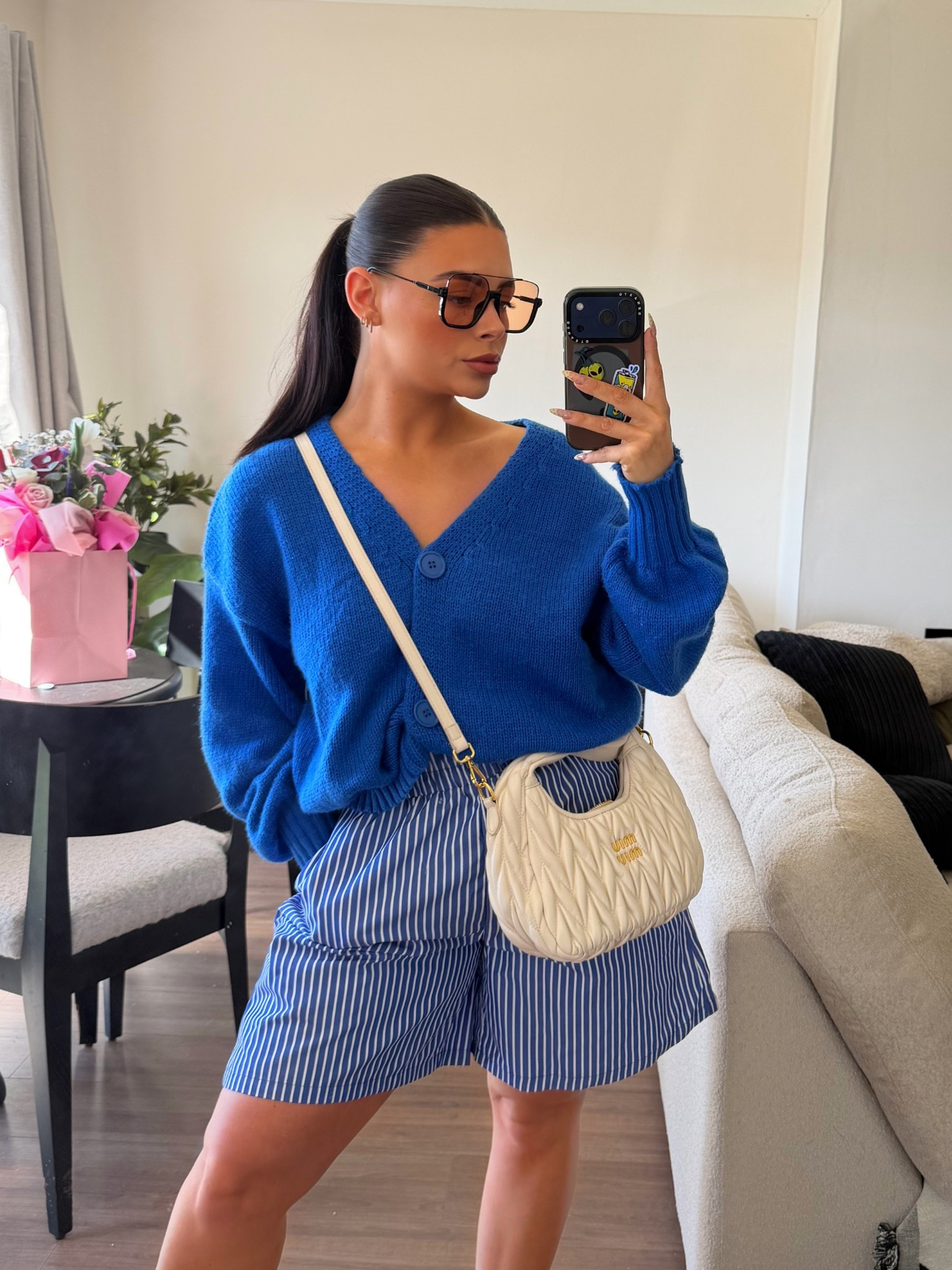 This outfit is giving effortless but put together 💙✨

The coziest oversized cardigan paired with these lightweight striped shorts = the perfect everyday combo you’ll wear on repeat. It’s one of those looks that feels like loungewear but looks fully styled 🙌

Dressed it up with a chic neutral bag + sunnies for that elevated, off-duty vibe 🤍

If you’re building a capsule wardrobe or just want easy pieces you can mix & match… these are SO good 👏 Everything is linked for you!

#LTKStyle #LTKOutfit #LTKSpring #EasyStyle #EverydayLooks #NeutralStyle

#LTKstyletip #LTKmodest #LTKspring