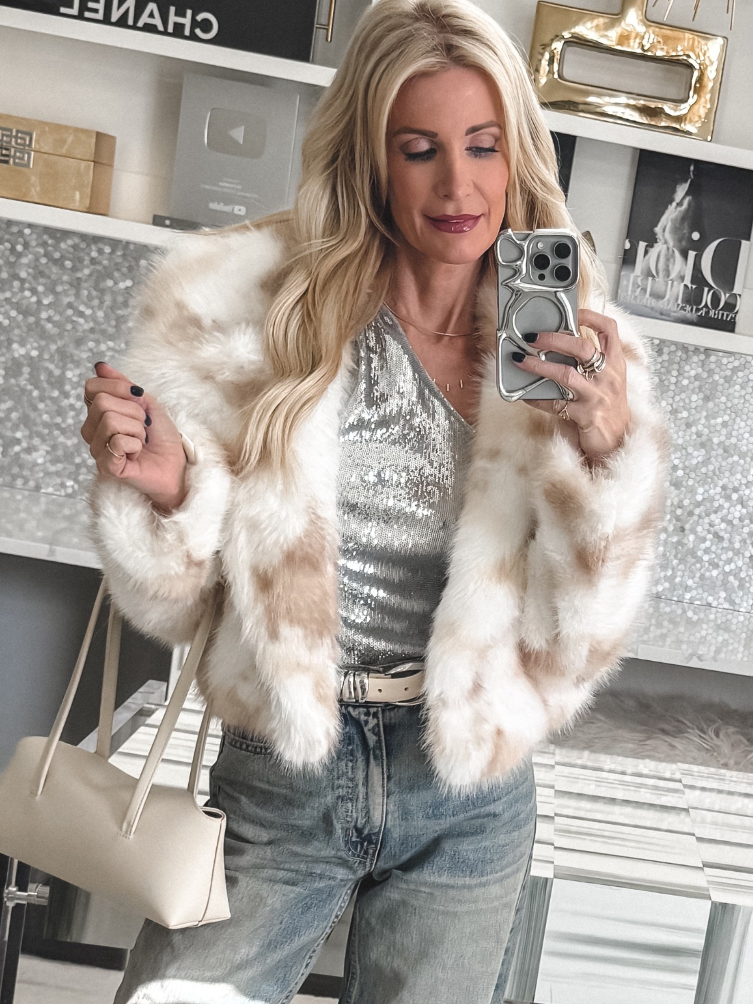 This fabulous faux fur jacket is my secret weapon for instantly elevating any New Year’s Eve outfit. I love how throwing on a faux fur—especially one this soft and luxe—takes even a casual look and makes it feel intentional, polished, and very NYE-appropriate. It’s the perfect finishing layer when you want warmth, texture, and that little bit of glam without trying too hard.

I’m wearing the faux fur in XS, and it fits true to size. 

 

#LTKHoliday #LTKSeasonal #LTKOver40
