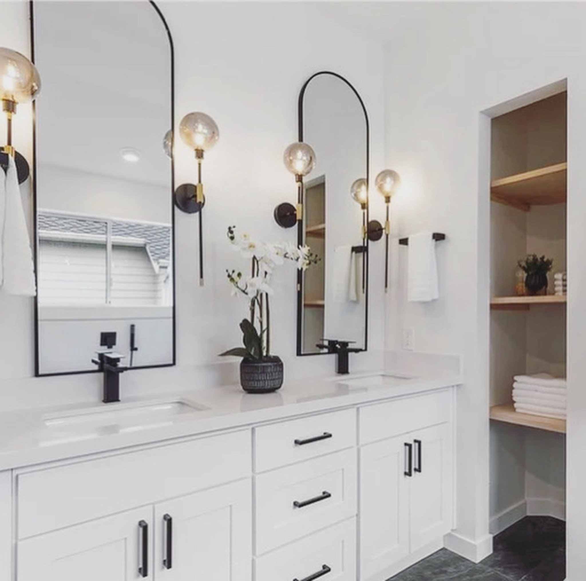 Two Simple and Affordable Design Elements Completely Transformed this Standard White Shaker Bathroom

#bathroommirrors #bathroomsconces #whiteshakerbqth #bathroomdesign

#LTKhome #LTKfindsunder100