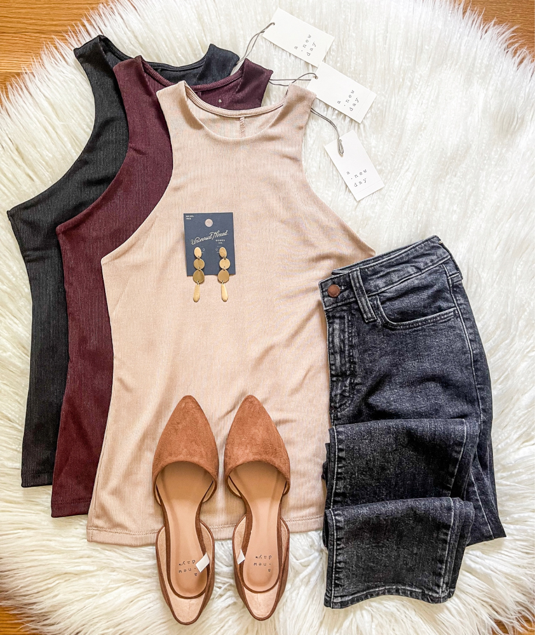 Happy Friday Friends 🤍 Excited to share these NEW High Neck Tanks with you!  You guys these are SO GOOD! There’s a slight shimmer and the fit is so flattering!  AND they are only $12 and look way more expensive 🤩  Everything here is linked for you! Have a great weekend !

#LTKstyletip #LTKSeasonal #LTKunder50