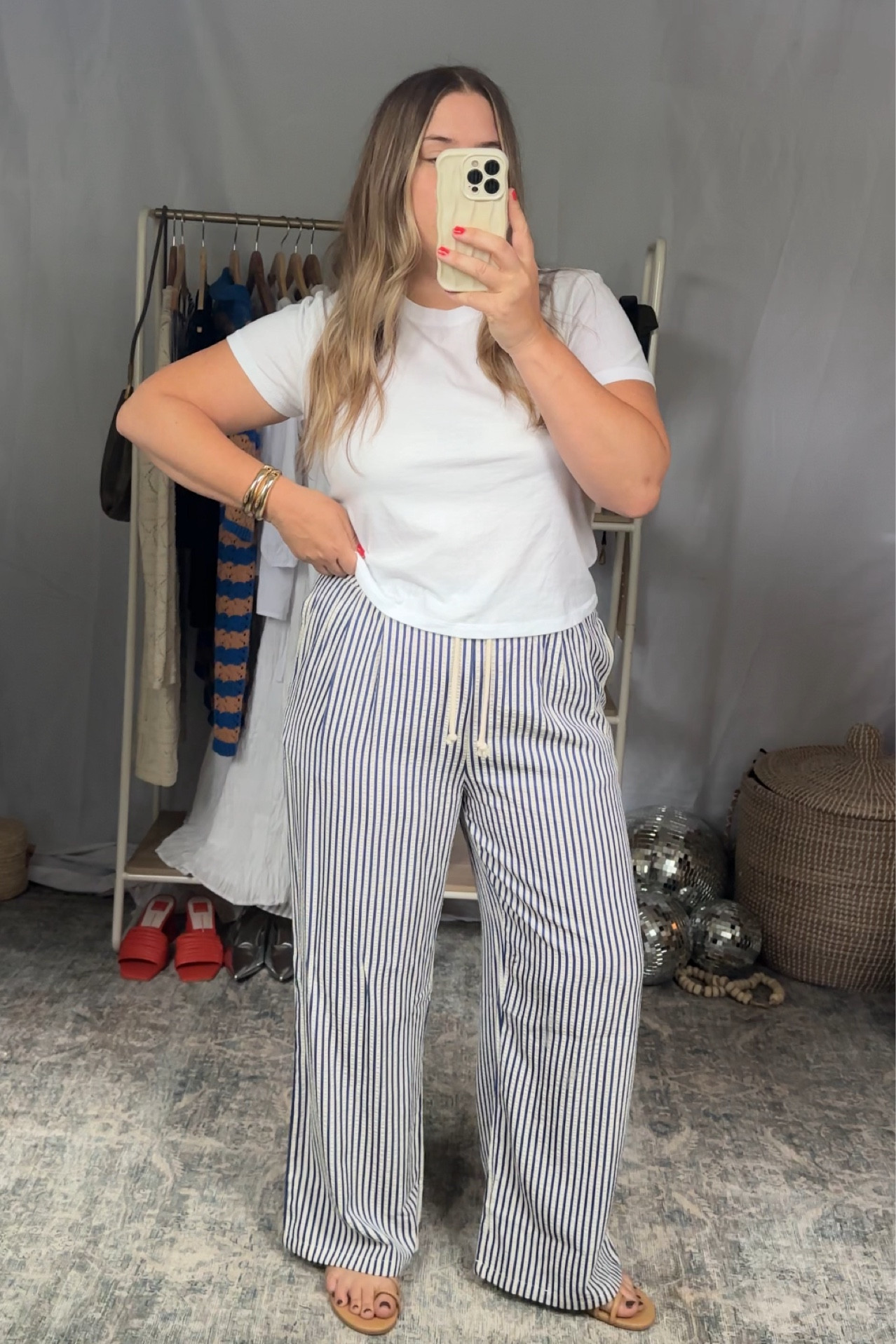Pants - im in medium ( snug pulling up over my butt but true to size fit is good for me) 

Shirt i went with my larger size ( large in tee ) . I have this one in black, cream, tan , white and striped. Love the fit! 