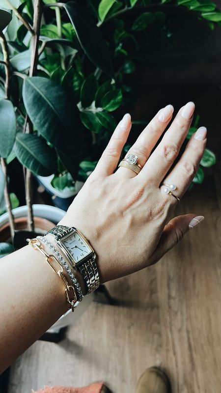 Arm stack inspo! This is what I wear on special occasions. BTW These press on nails are STRONG. Love the neutral design! My ring is a 3 carat Asscher diamond from Frank Darling set in 14k gold. Everything else is from a local jewelry store and I’ve linked similar items below.
-
Arm stack - Cartier dupe watch - Cartier style watch - two tone bracelet strap watch - paperclip gold bracelet - diamond tennis bracelet white gold - pearl ring - affordable jewelry - fine jewelry - press on nails Target - Bulova women’s watch - Asscher diamond ring - neutral press on nails chill house - pavé cigar band ring - open pearl ring Etsy - Nordstrom jewelry - Bloomingdale’s jewelry 

#LTKover40 #LTKstyletip #LTKworkwear