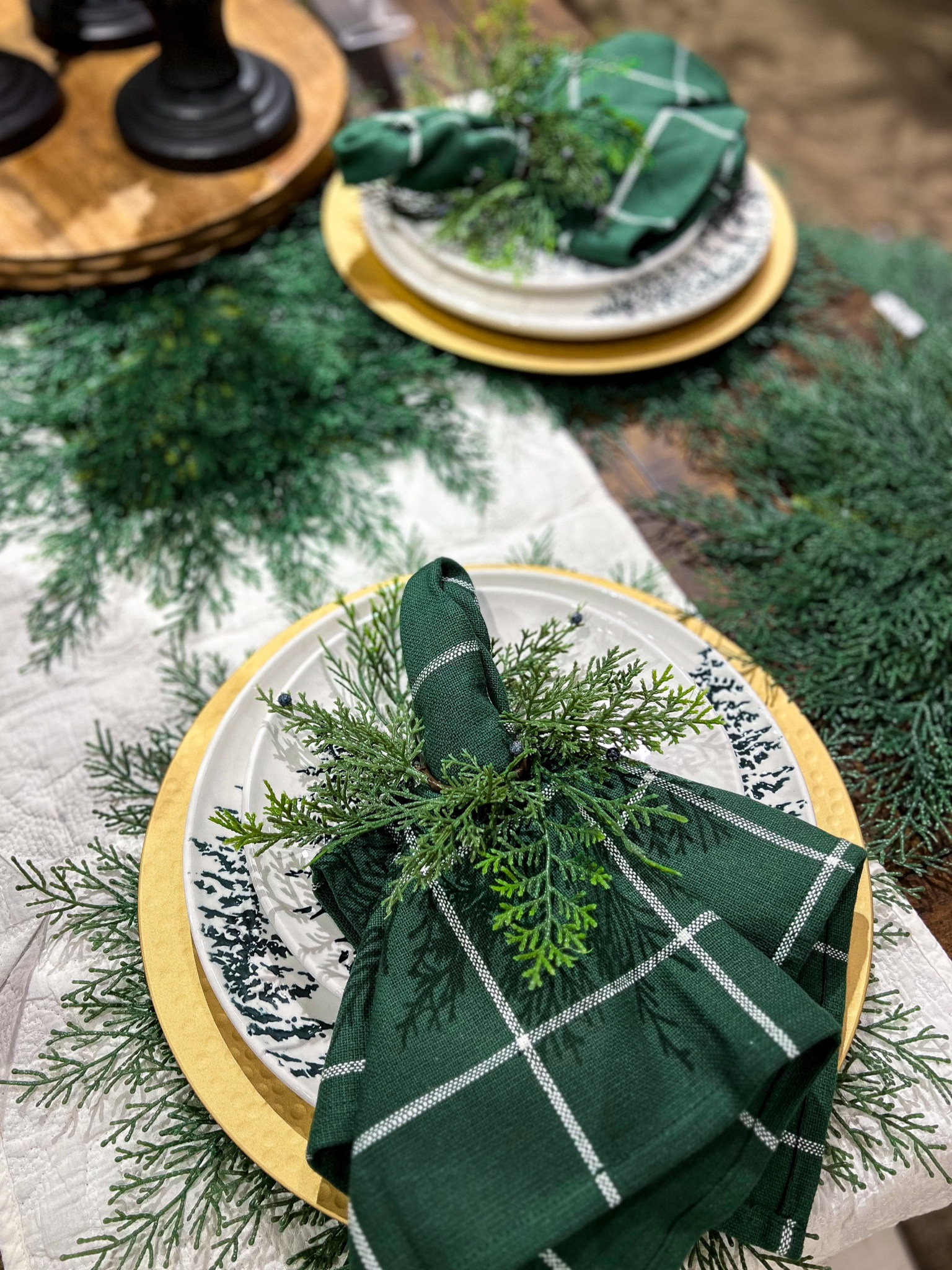 Christmas table setup from Kirkland’s home. I love love love these faux Cedar round placements & the whole evergreen collection. Evergreen dinner plates / Serving plate / serving tray / salad plate / soup bowl / napkin ring / table runner 
Christmas party / Christmas Eve Dinner / Christmas morning 

#cedar #kirklands #evergreen #table #setup #christmas 