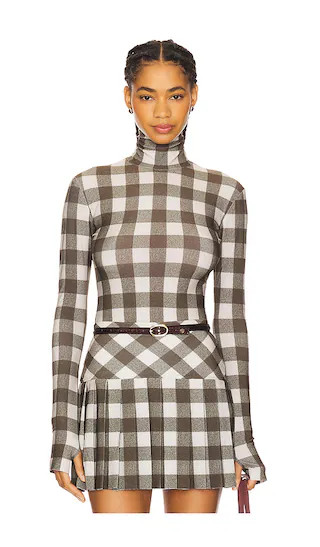 Norma Kamali Slim Fit Long Sleeve Turtleneck Top in Olive. - size L | Revolve Clothing (Global)