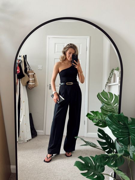 All black outfit, marks and Spencer fitted trousers, tailored trousers, one shoulder top, Amazon fashion, mango heels, black clutch bag, black accessories 

#LTKuk #LTKstyletip #LTKspring
