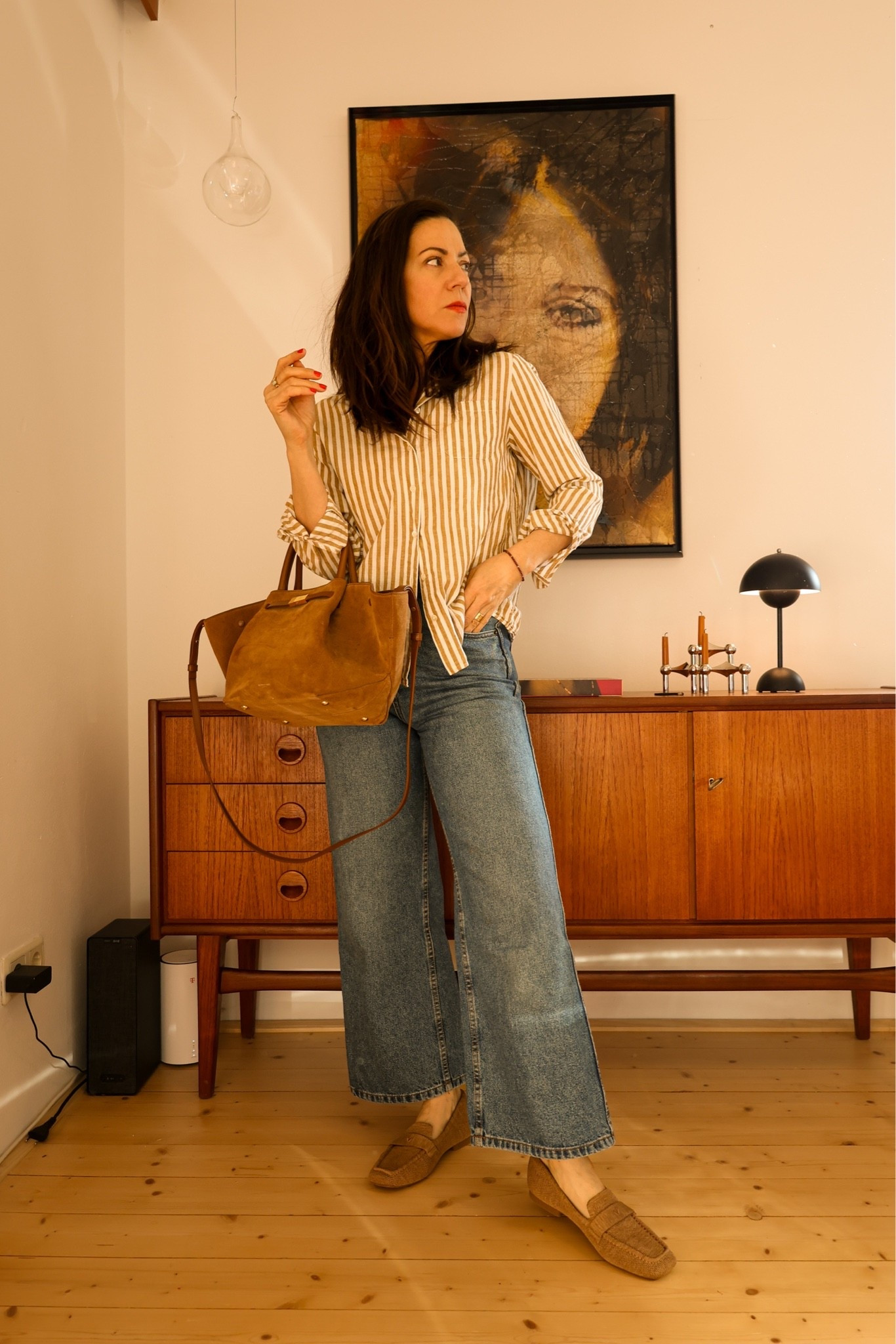 Effortless and easy Spring outfit. Striped shirt, blue jeans, brown loafers and a brown suede handbag.

Shoes: Icon Loafers Vivaia
Handbag: Demellier
Shirt: Sézane Tomboy shirt
Jeans: Sézane le crop

#LTKOver40 #LTKmomlife #LTKgrwm
