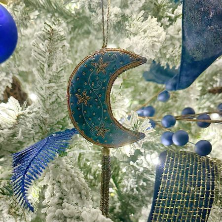 Christmas ornaments from world market this moon is so beautiful in a cobalt navy tone with gold beading adding a couple others I loved too.. 

#christmas #ornaments #moonornament #worldmarket 

#LTKHoliday #LTKSeasonal #LTKhome
