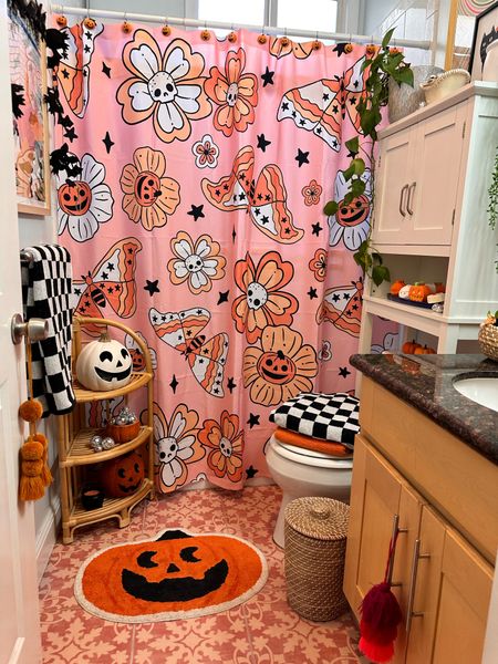 Spooky bathroom!! Halloween lovers come on over and make your bathroom perfectly spooky this year!! Shower curtains and bath towels and pumpkins and skeletons 

#LTKfindsunder50 #LTKSeasonal #LTKhome