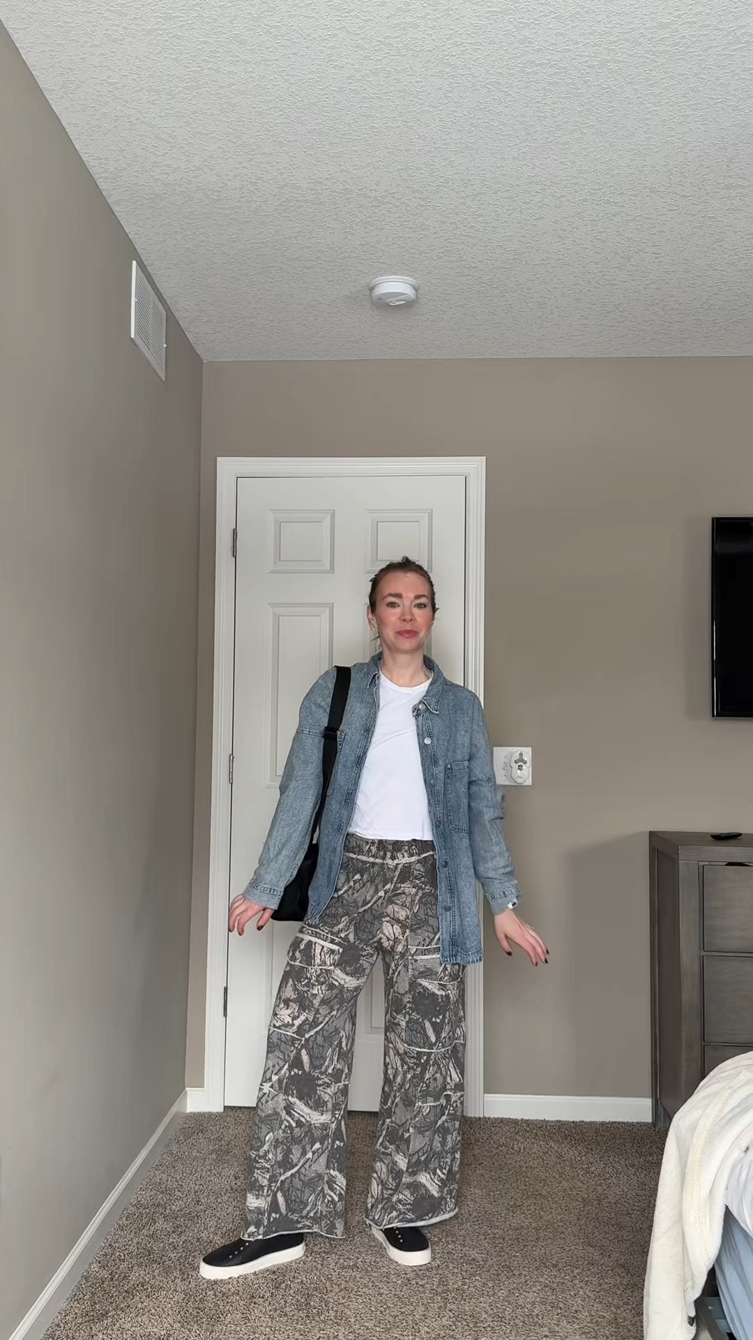 When you want comfy but still interesting.

Oversized denim layered over statement wide leg pants has been one of my favorite spring outfit combos lately. Easy base pieces but the print keeps it fun without trying too hard.

Perfect casual outfit for errands, coffee runs, or busy mom days when leggings feel boring.

Linked my denim shirt, pants, shoes, and everyday bag in LTK.

casual mom outfit, relaxed denim outfit, wide leg pants styling, everyday outfit ideas, comfy outfit inspo, spring casual outfits

#LTKootd #LTKmomlife #LTKSpringSale