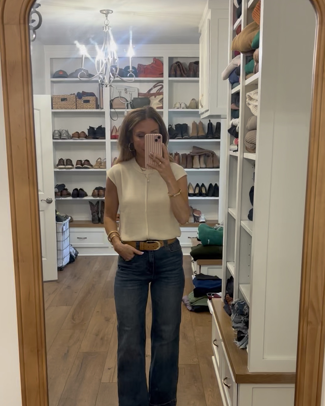 The lighting in my closet is so dark, so I snapped a pic in a lighter m, brighter room so you could compare! Shoot me a comment if you want a link for the jewelry!!

@Commense 

Spring outfit 2026 | wide leg jeans | bootcut jeans | amazon sweater tank | spring outfit inspo | summer outfit inspo 

#LTKgrwm #LTKootd #LTKSeasonal