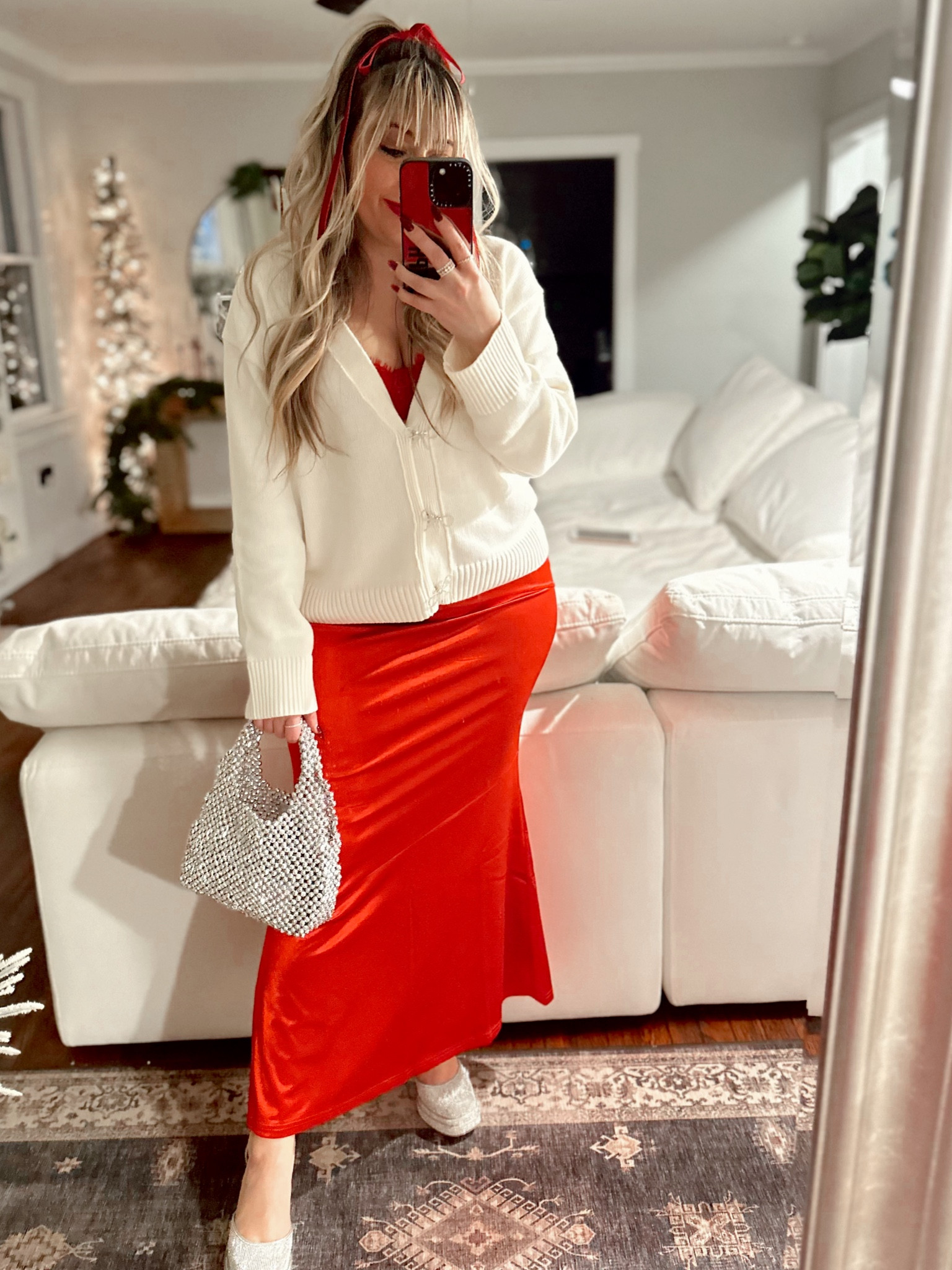 Holiday outfit - festive Christmas outfit - bow cardigan and silky maxi skirt with sparkley platform heels 

#LTKHoliday #LTKSeasonal