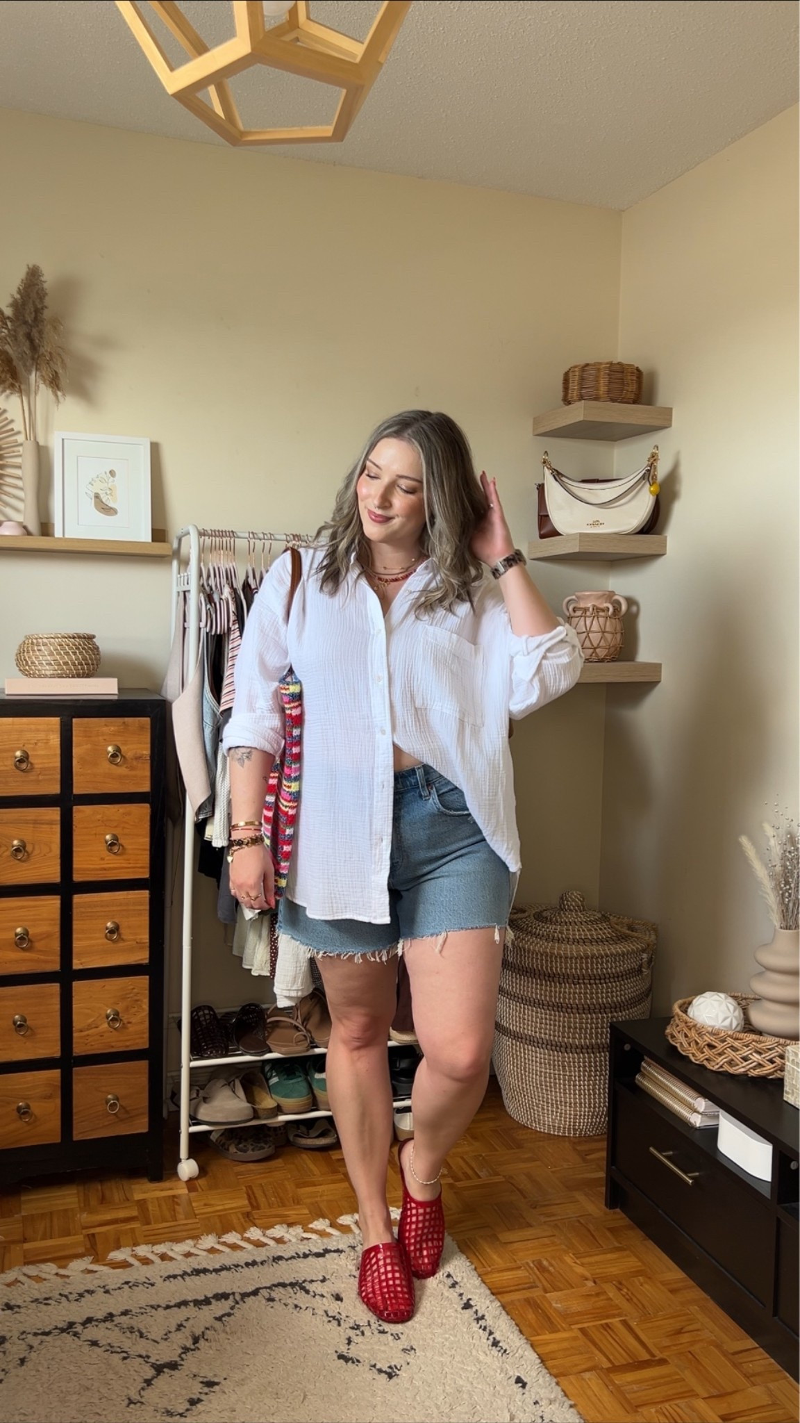 Easy summer outfit! Wearing my usual size L in the white button up shirt, sized up to 32 in the denim shorts. Jelly shoes are quite comfy, I’m a 9.5-10 shoe and wear a 10. Canadian shoe and bag links are under “similar products”

#LTKsummer #LTKsale #LTKmidsize